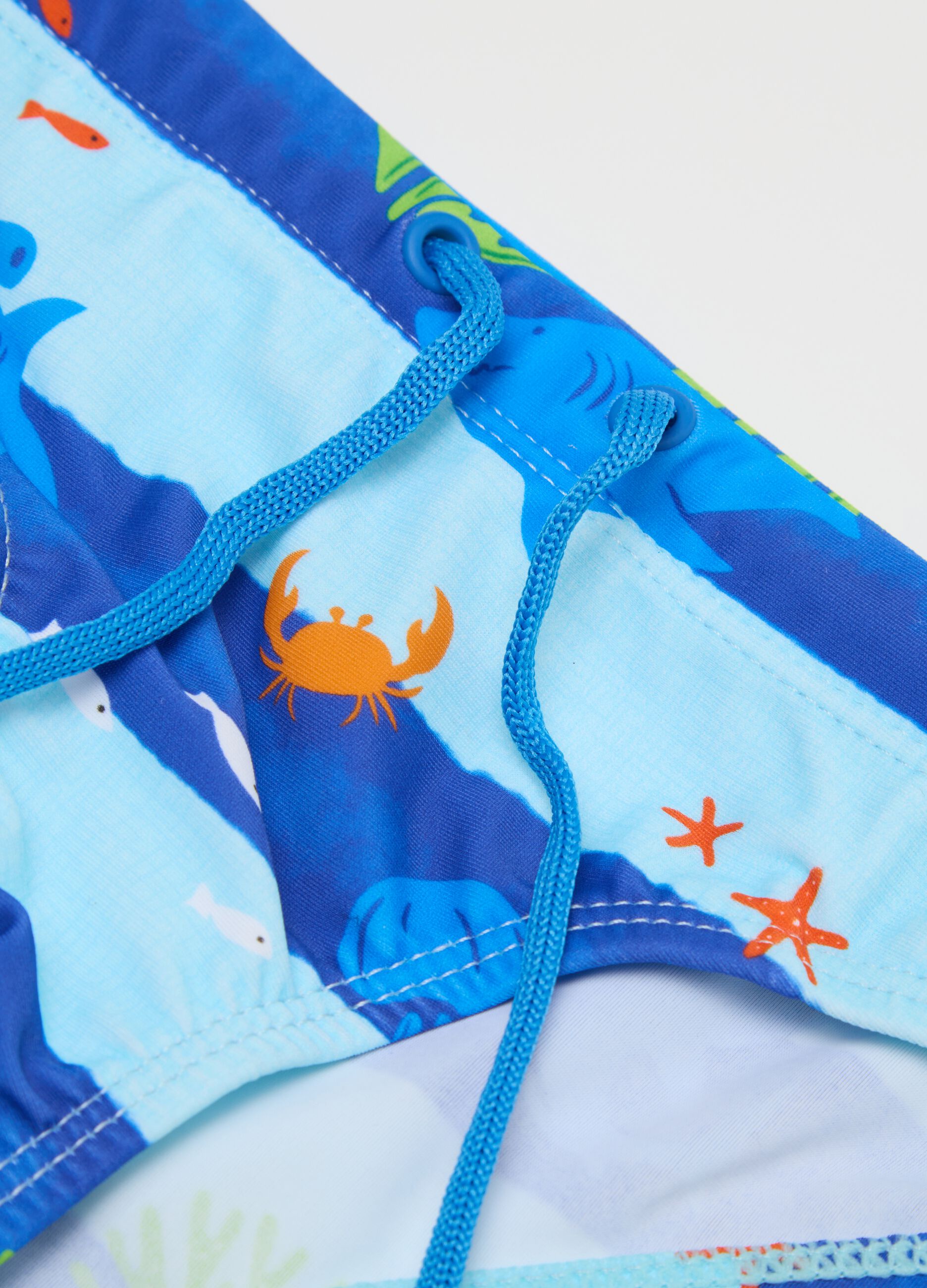 Blue kids' briefs with ocean pattern