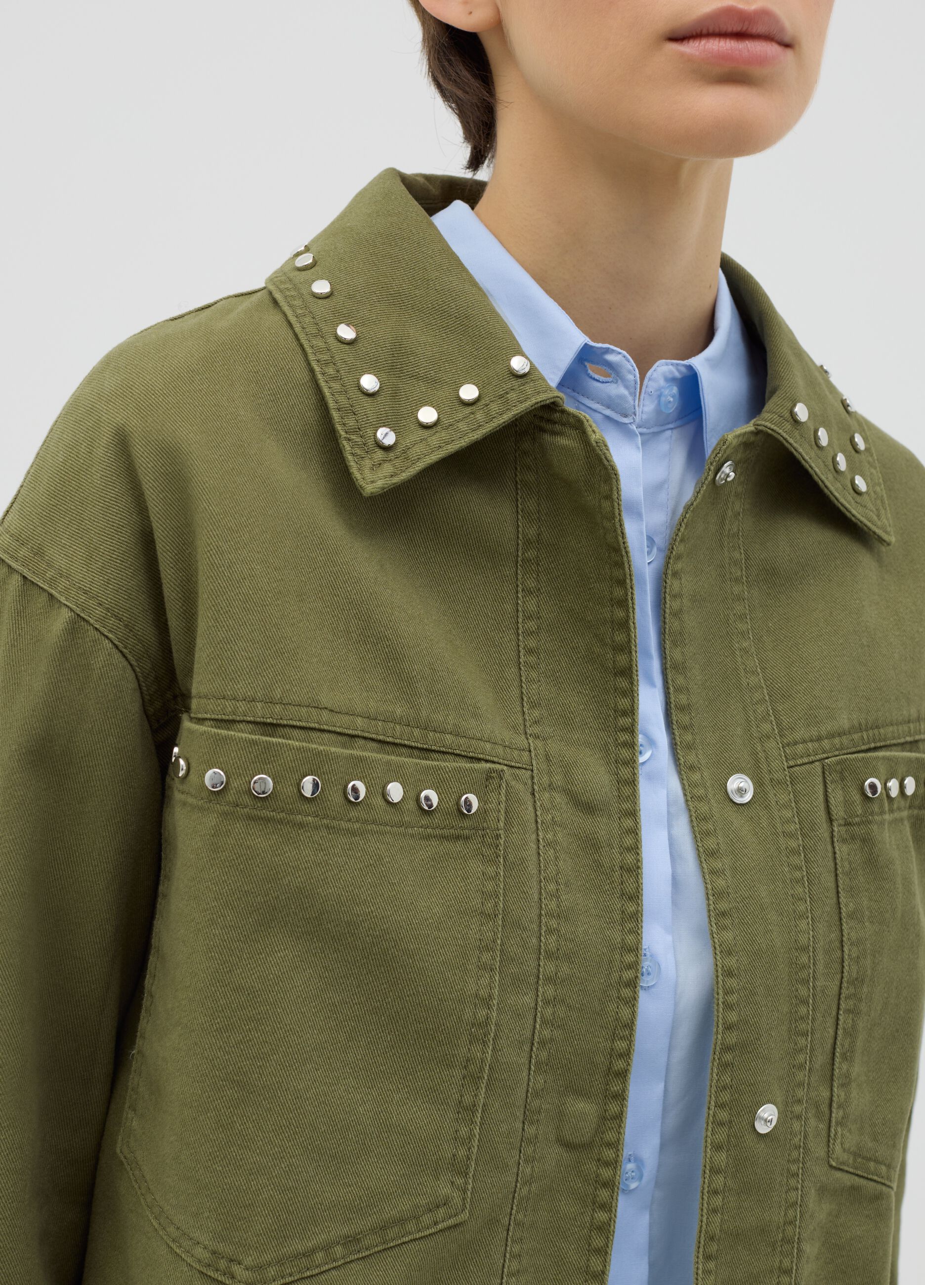 Green jacket in cotton with studs