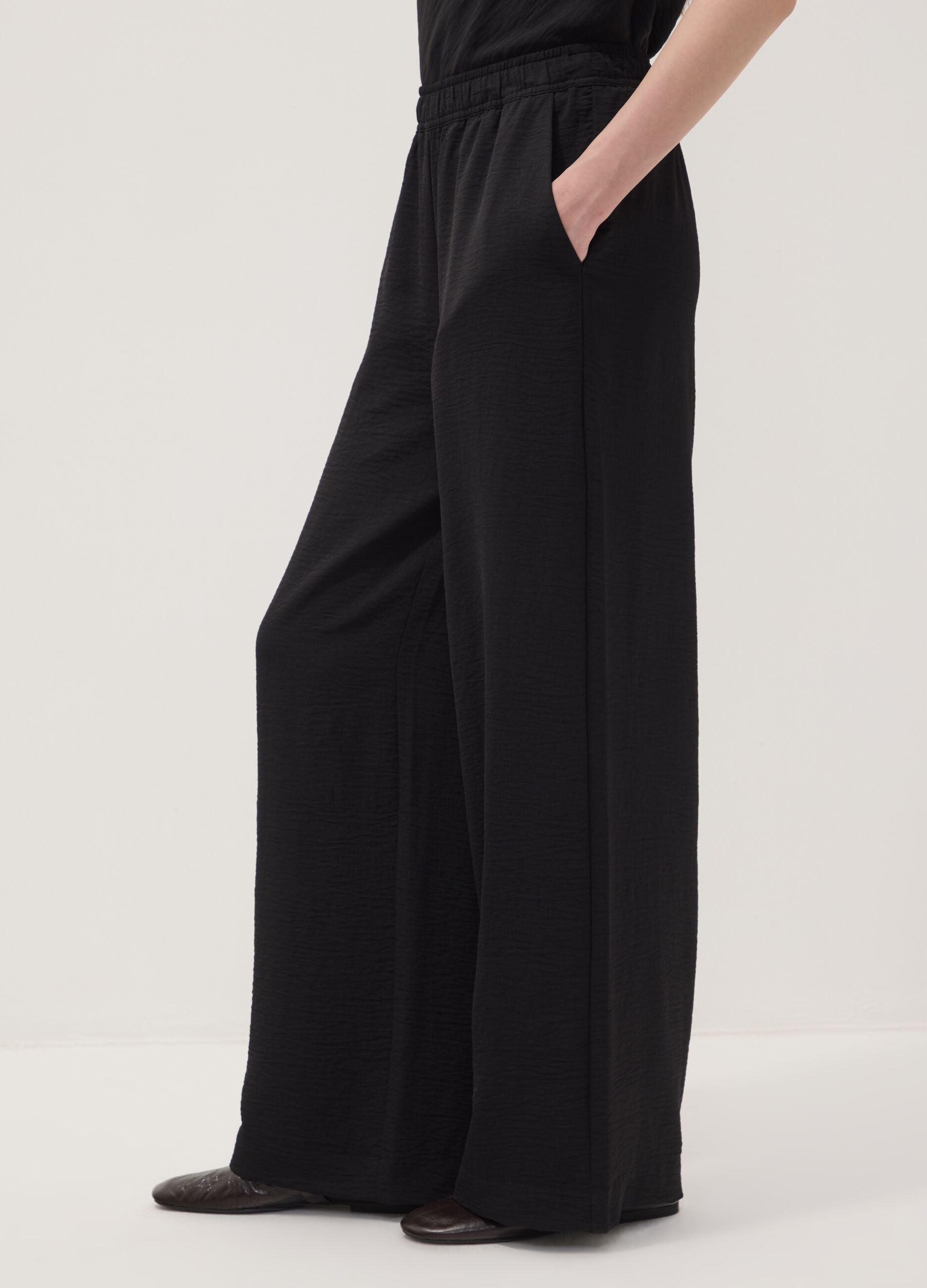 Black wide-leg trousers with elasticated waist