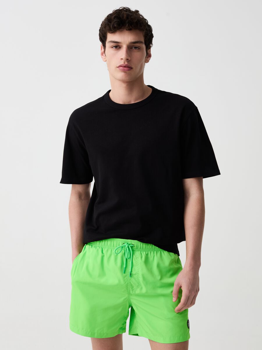 Fluorescent swimming trunks with logo patch_0