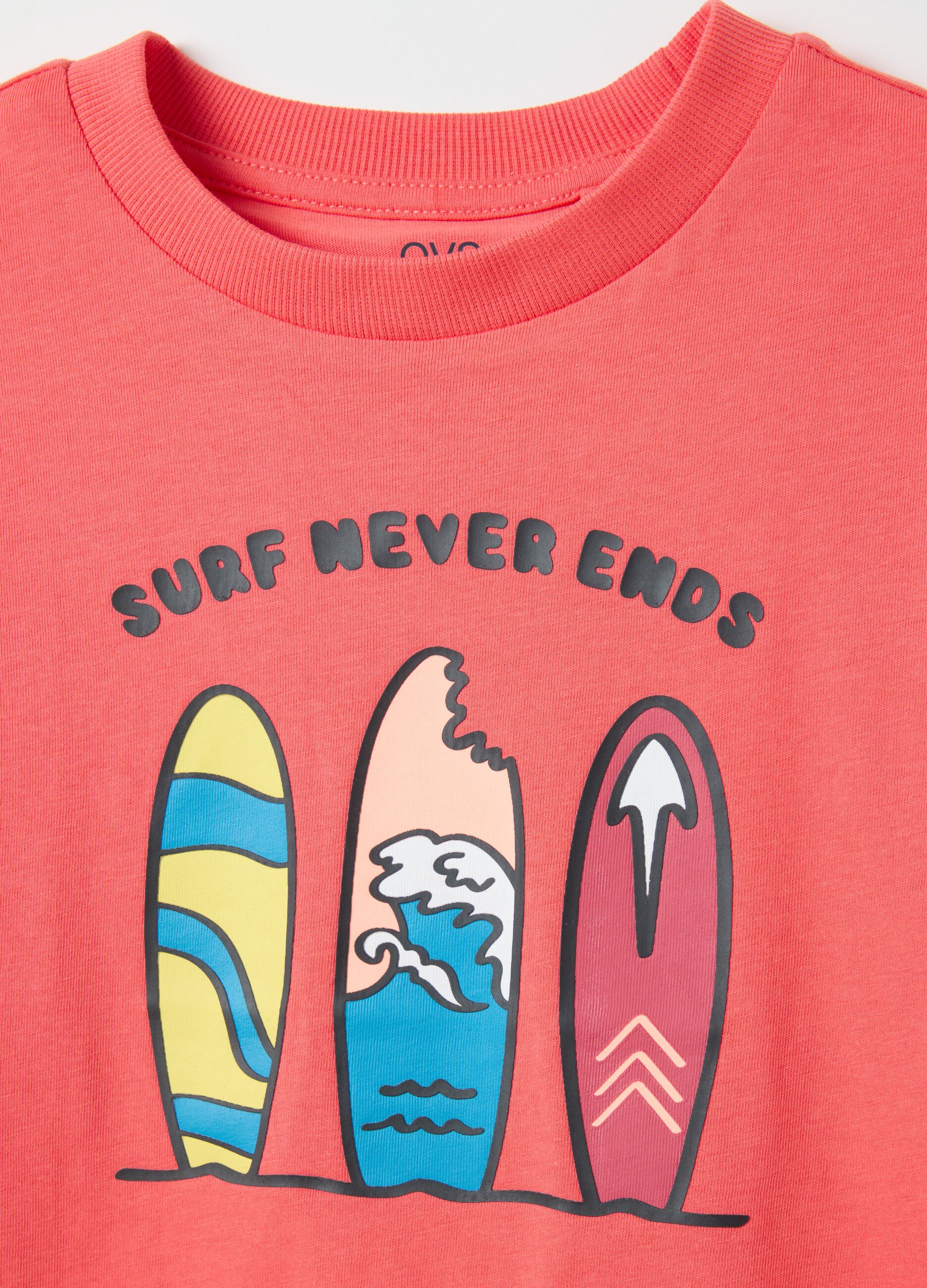 Pink cotton T-shirt with "Surf Never Ends" print