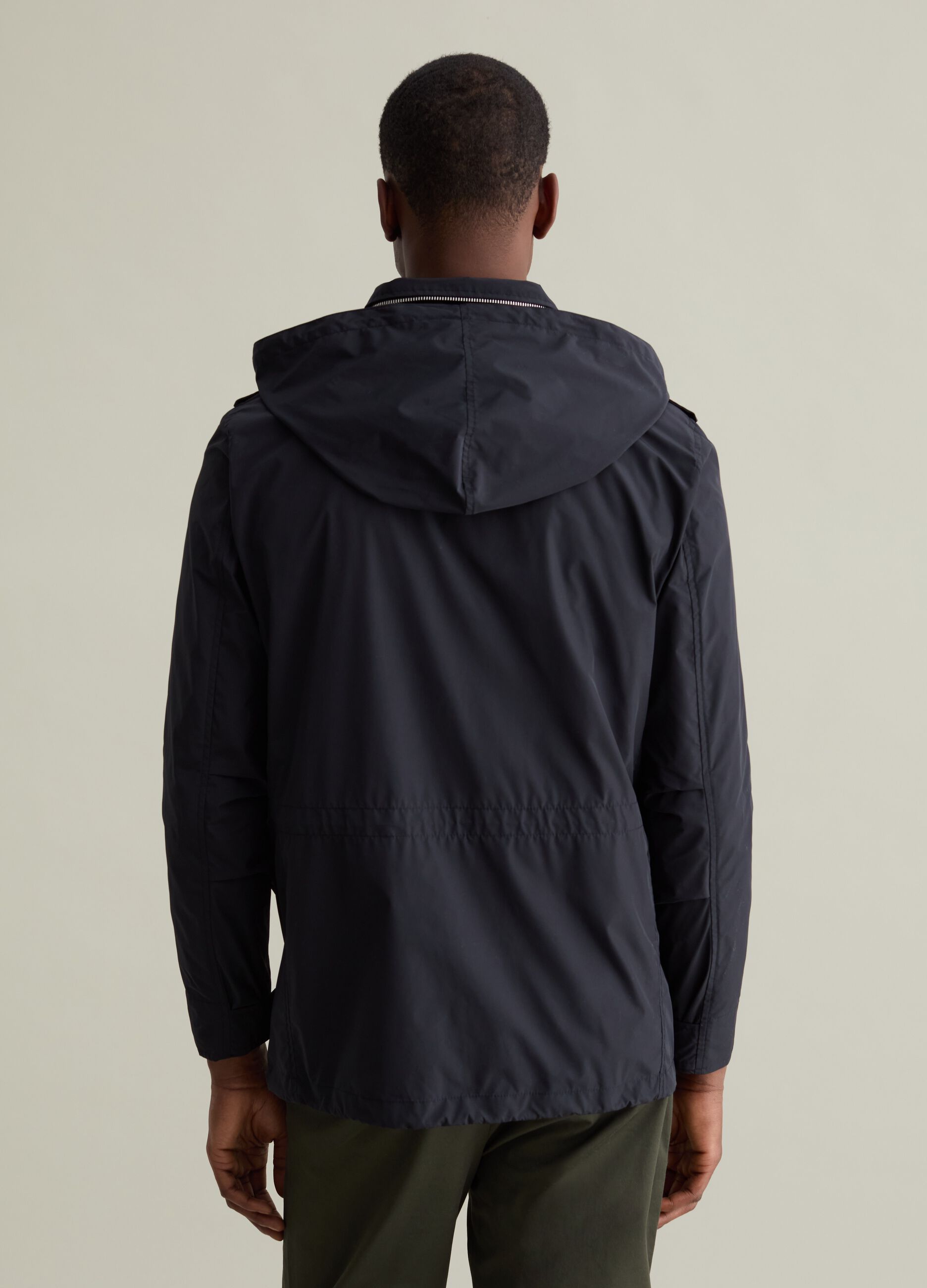 Short jacket with hood and pockets