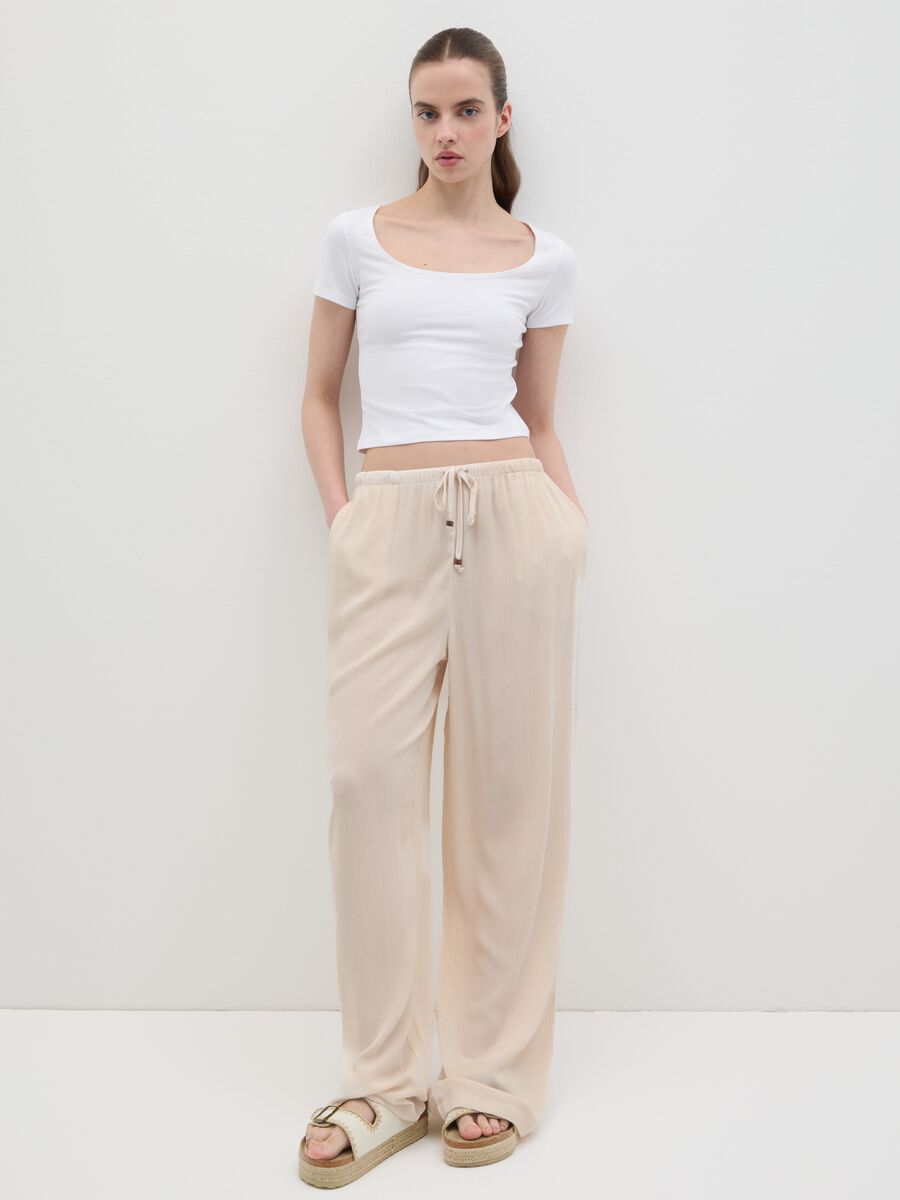 Women's beige relaxed-fit trousers in 100% viscose_0