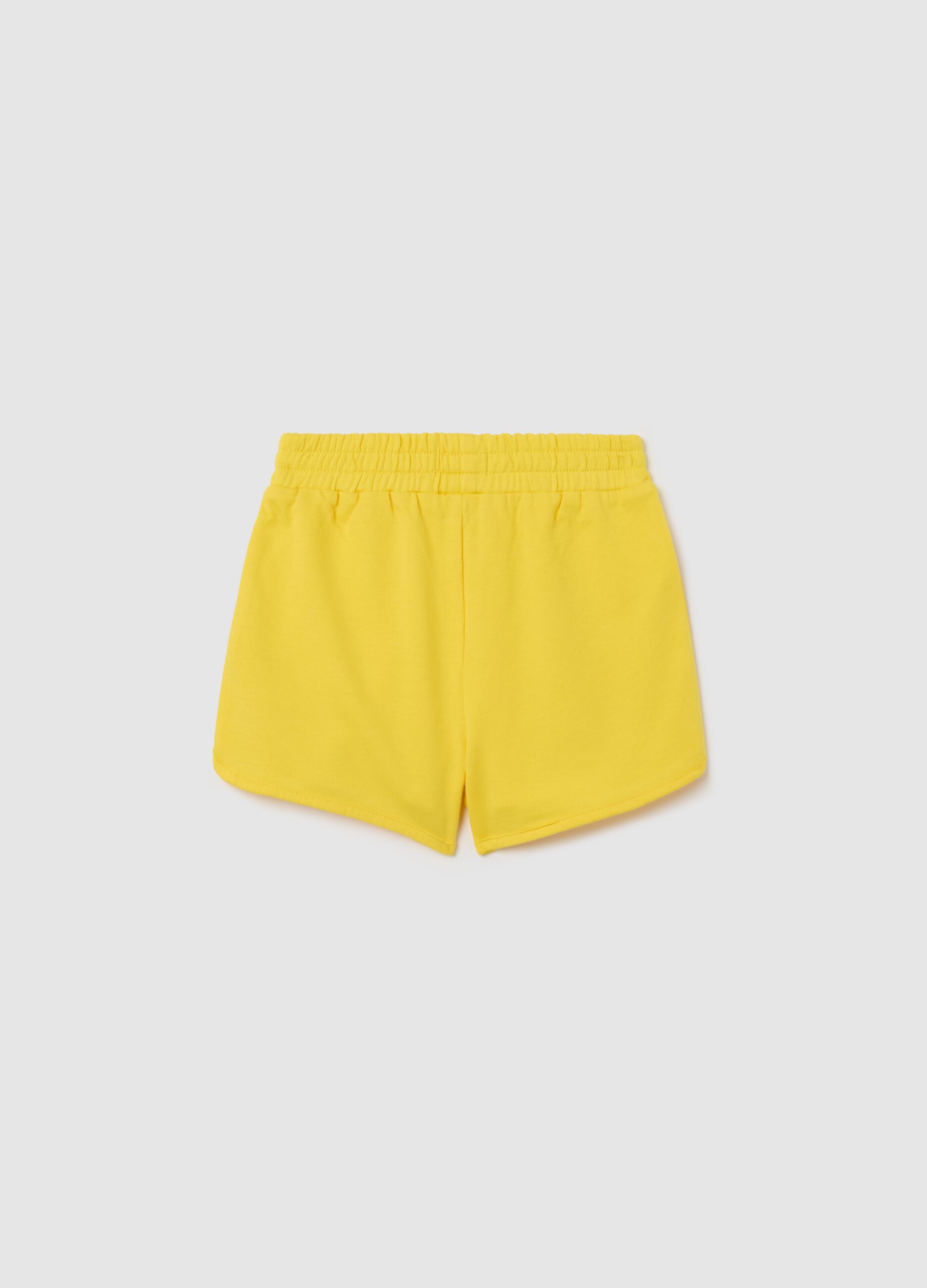 Yellow French terry shorts with print