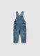Denim dungarees with abrasions_0