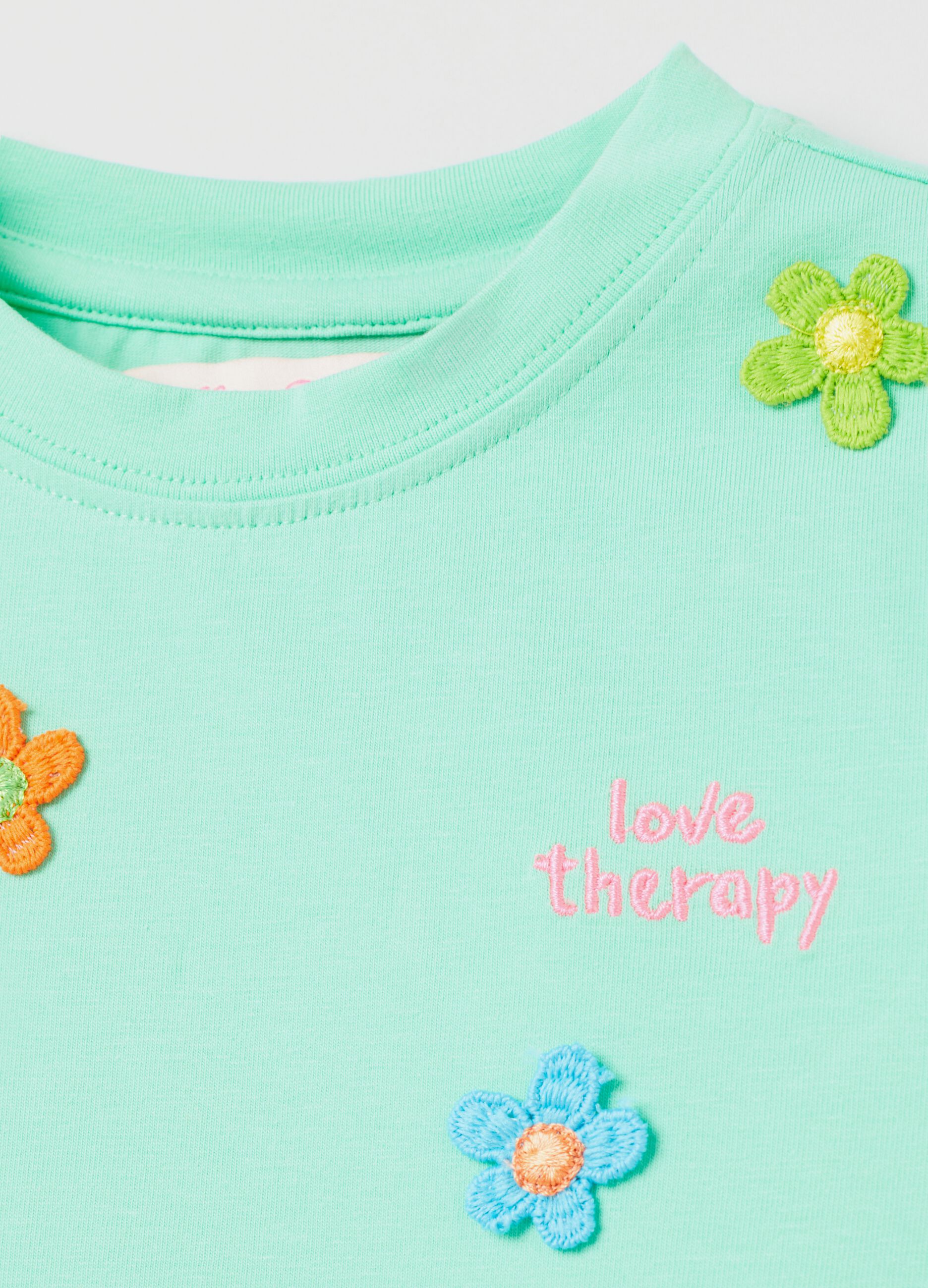 T-shirt with flowers and Love Therapy embroidery