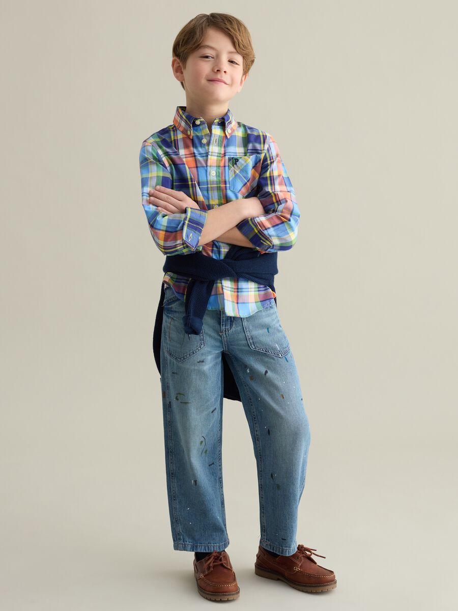 Misdyed-effect jeans with five pockets_1