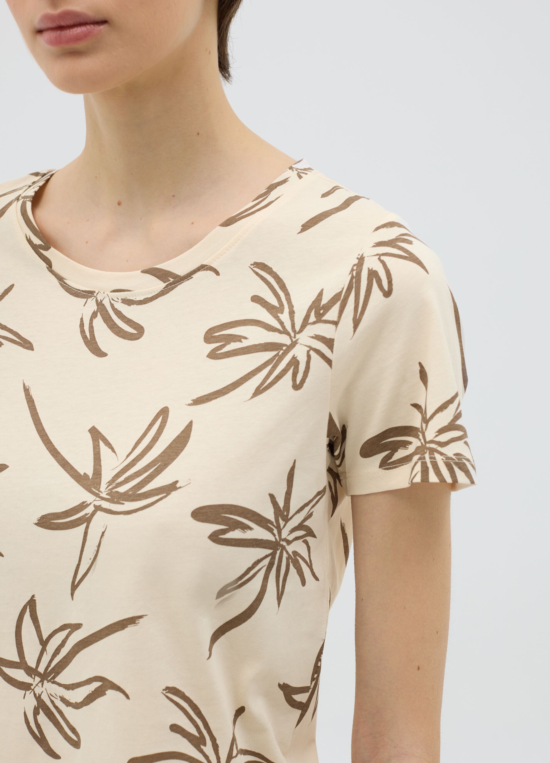 Beige T-shirt with floral print