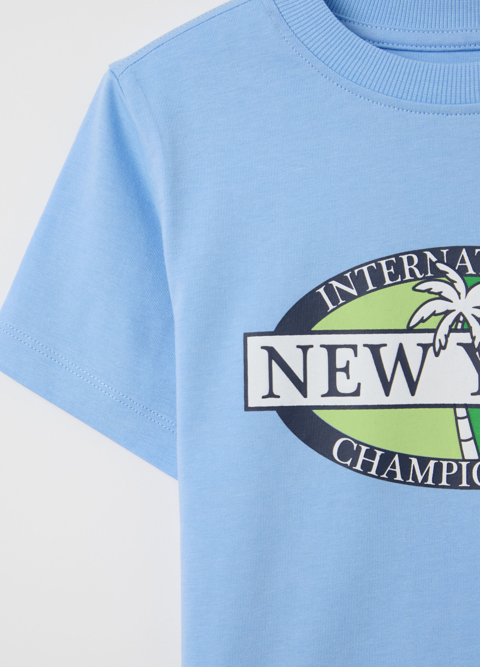 Light blue cotton T-shirt with lettering print