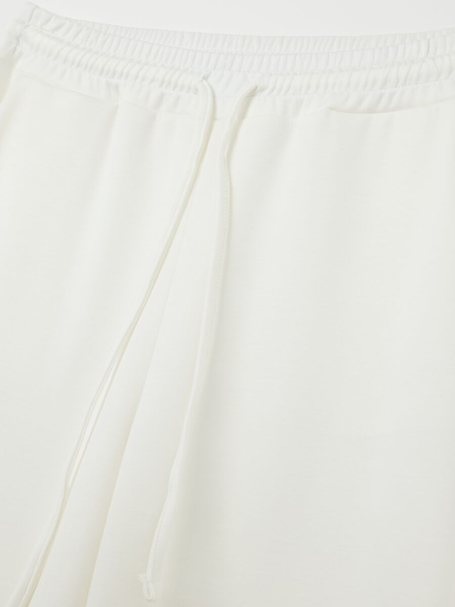 White palazzo trousers in stretch fabric_5