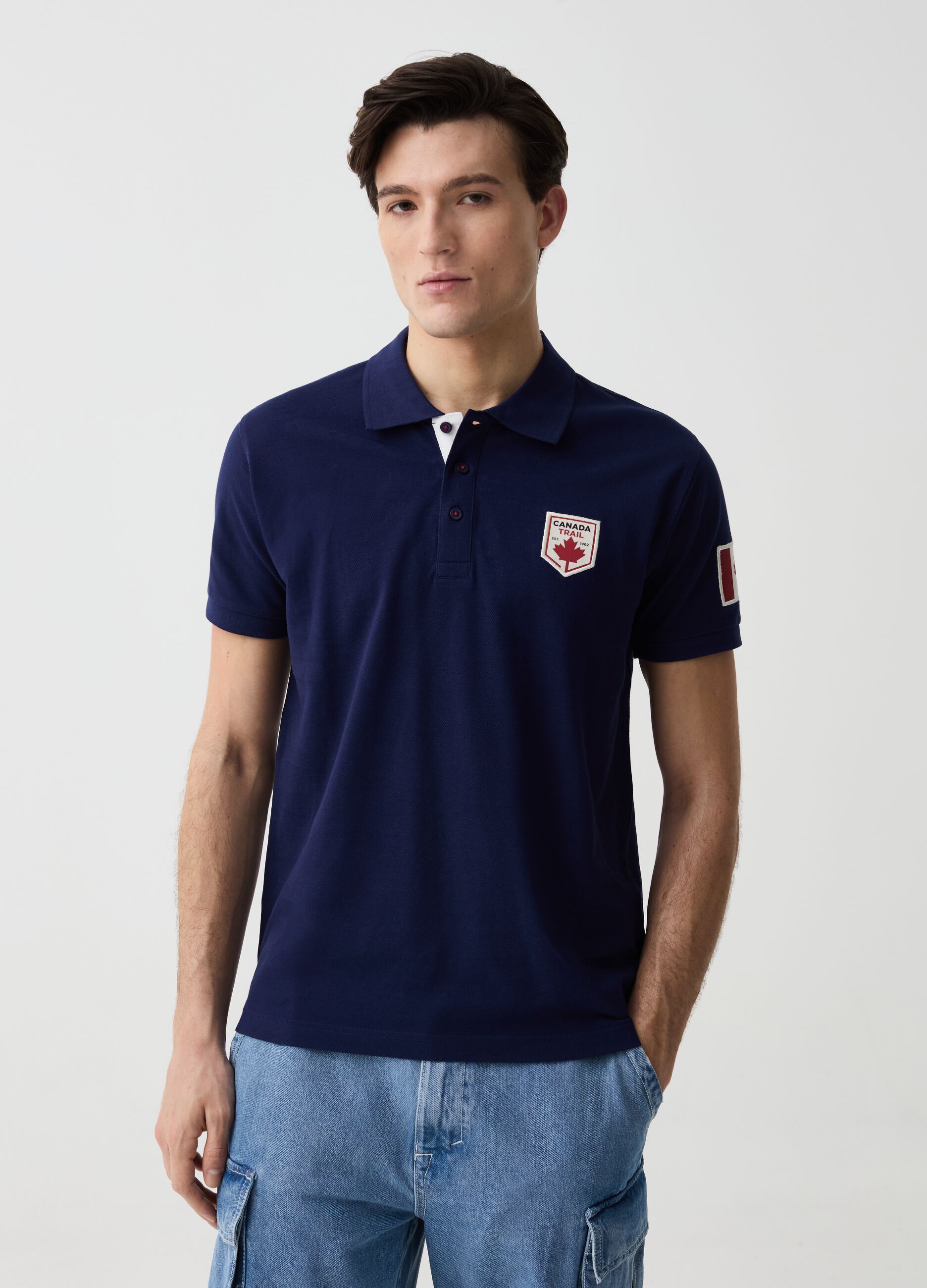 Polo con patch Canada Trail