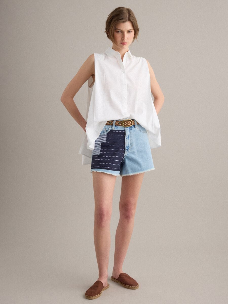 Light blue pure-cotton denim shorts with patchwork inserts_0