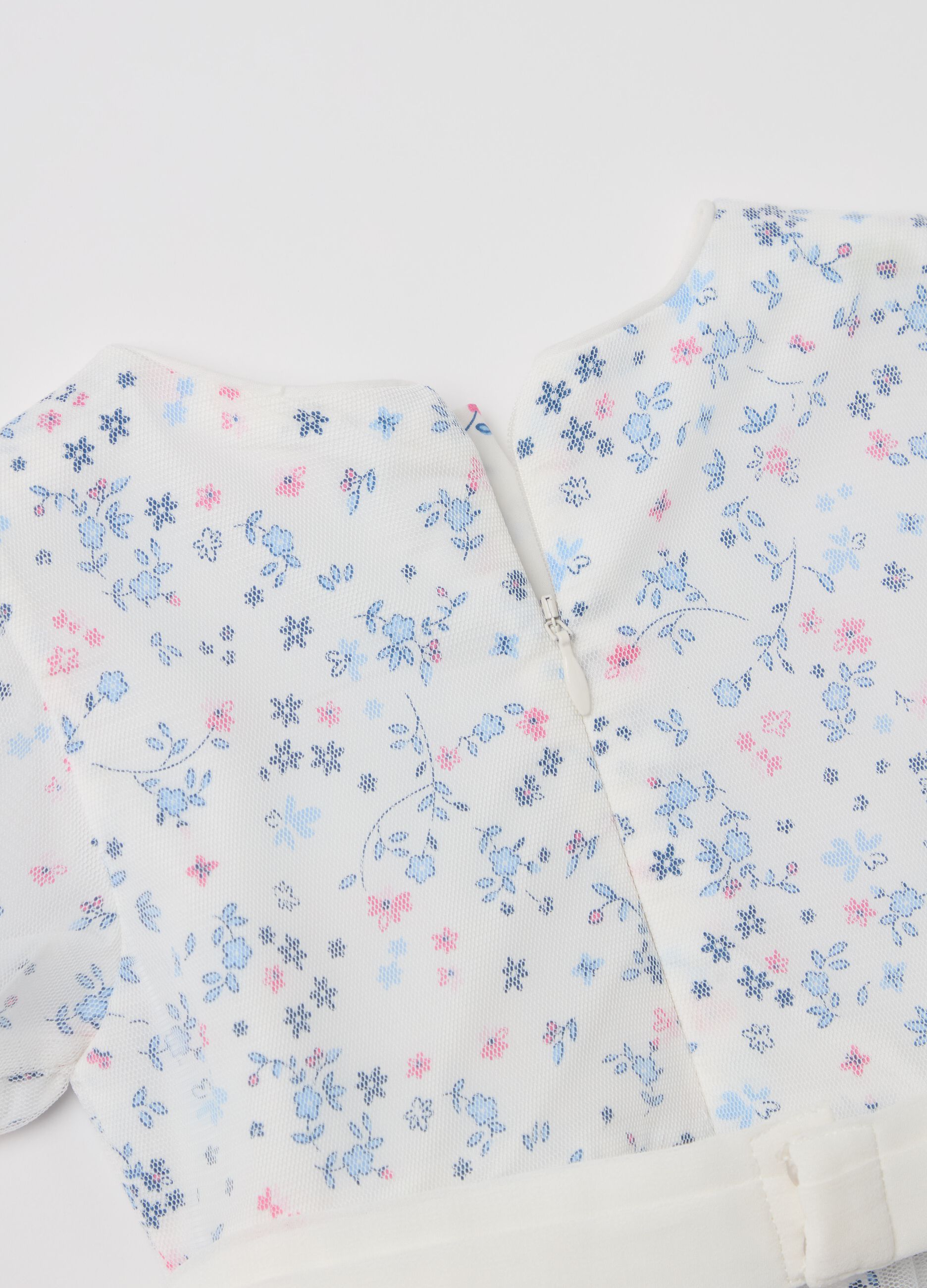 Dress with floral pattern and tulle