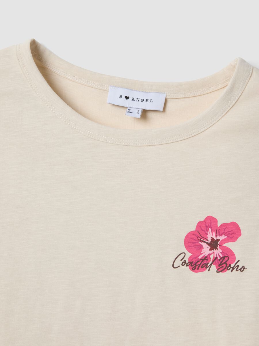 T-shirt beige in puro cotone relaxed fit con stampa floreale_5