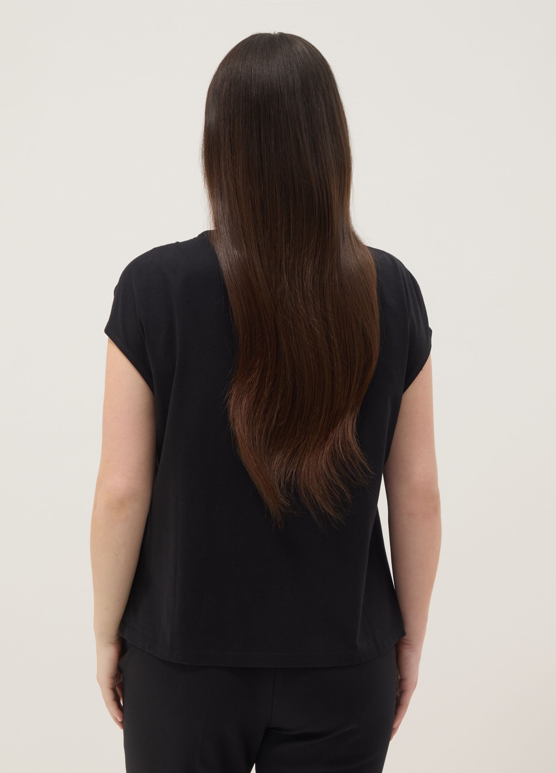Black pure cotton T-shirt with draping and brooch