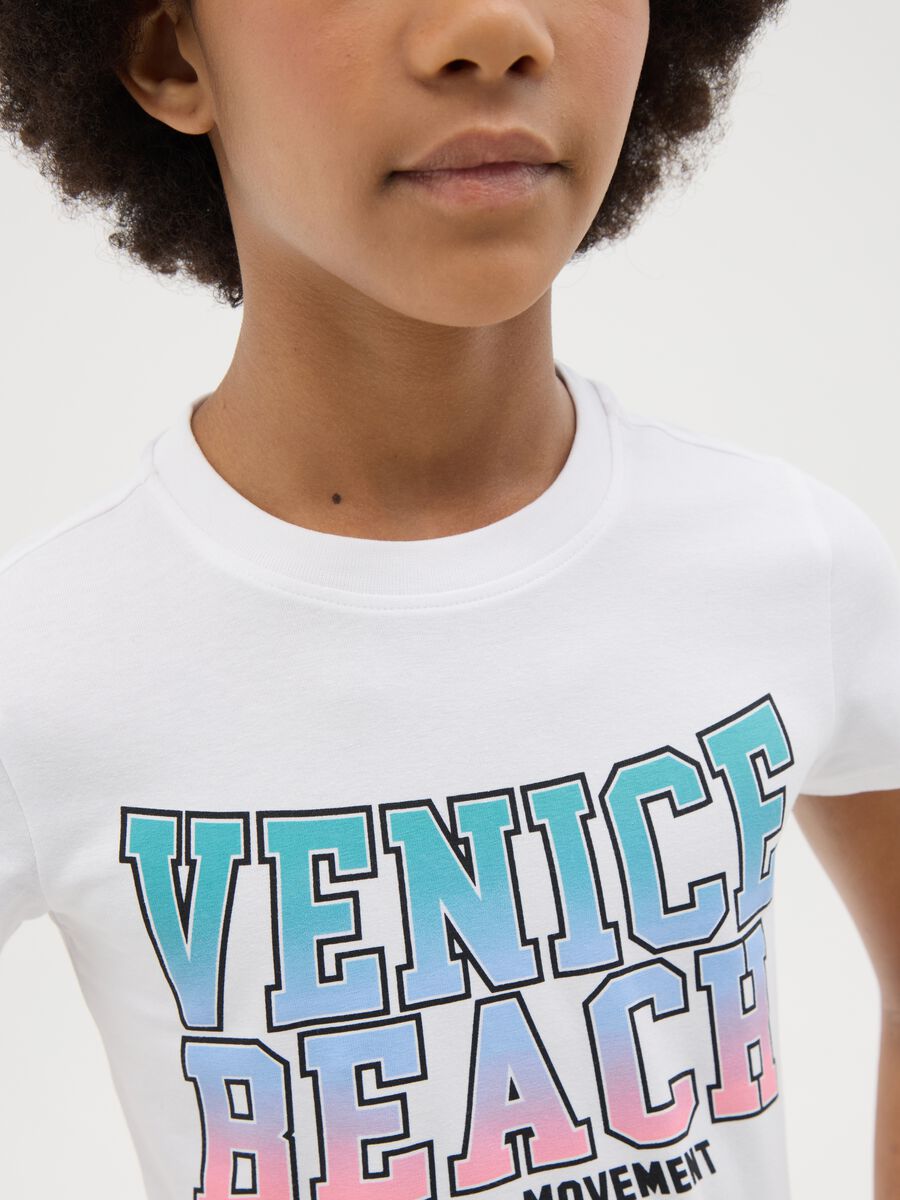 T-shirt bianca in cotone stretch con stampa_1