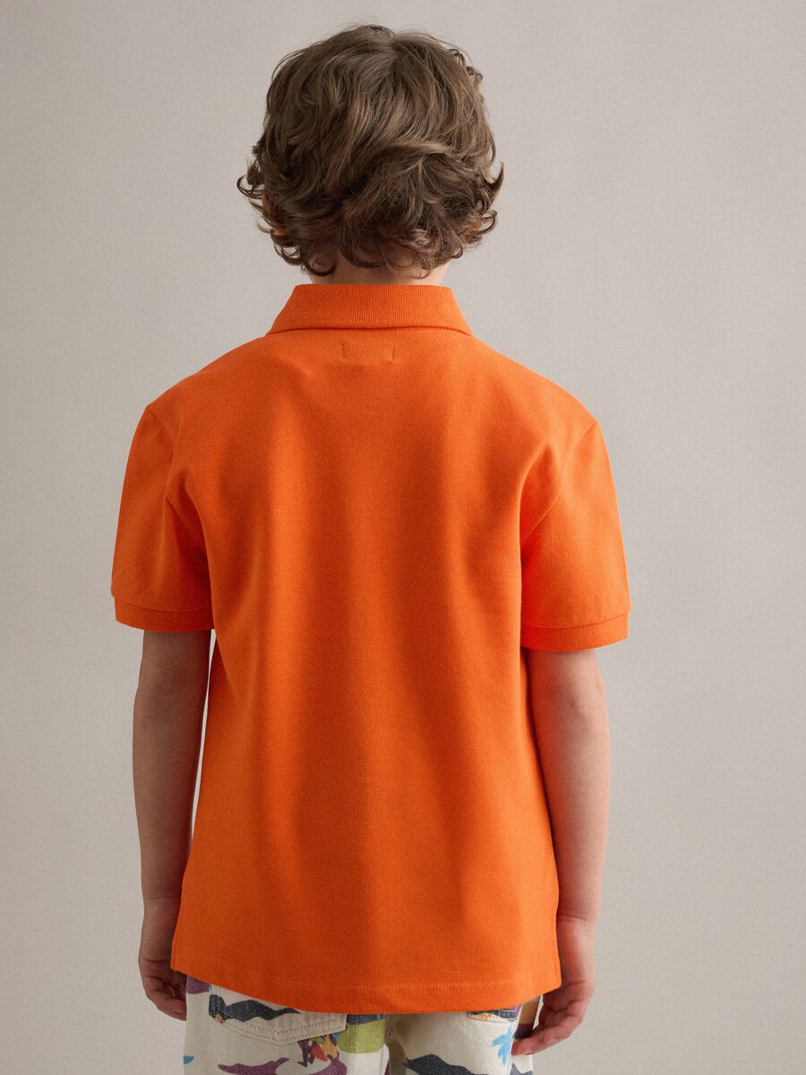 Polo in cotone elasticizzato arancione da bambino regular fit_1