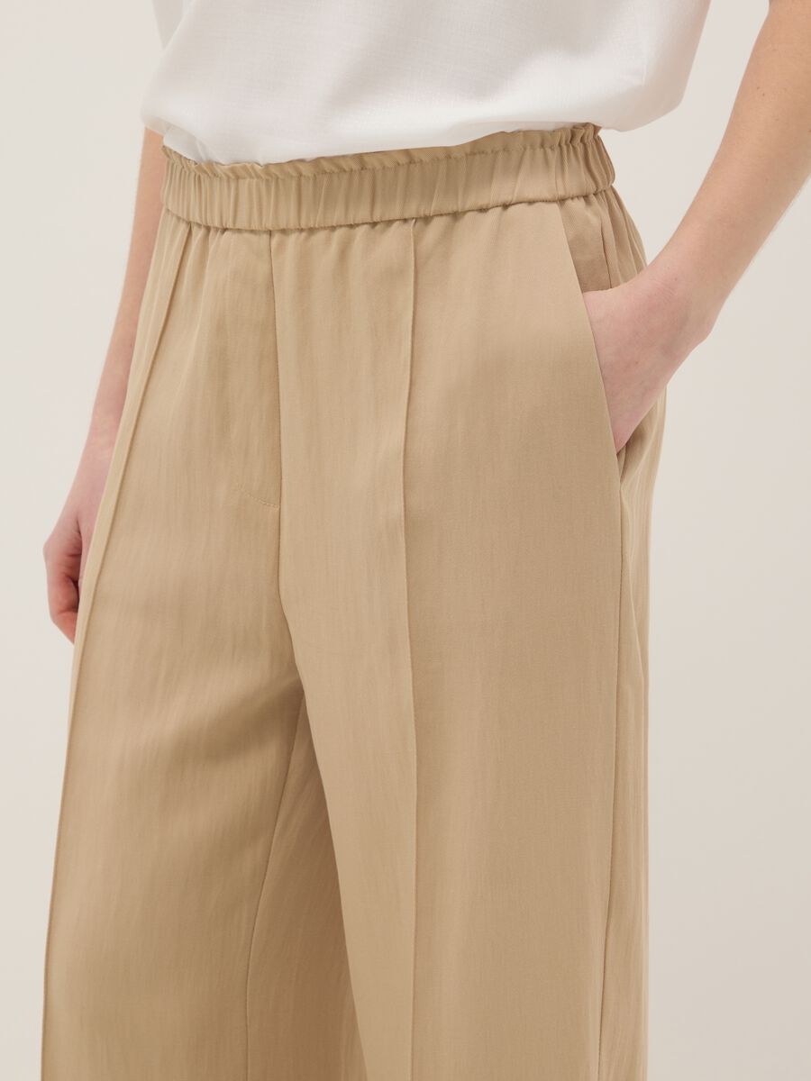 Beige wide leg jogger trousers in Lyocell and viscose blend_3