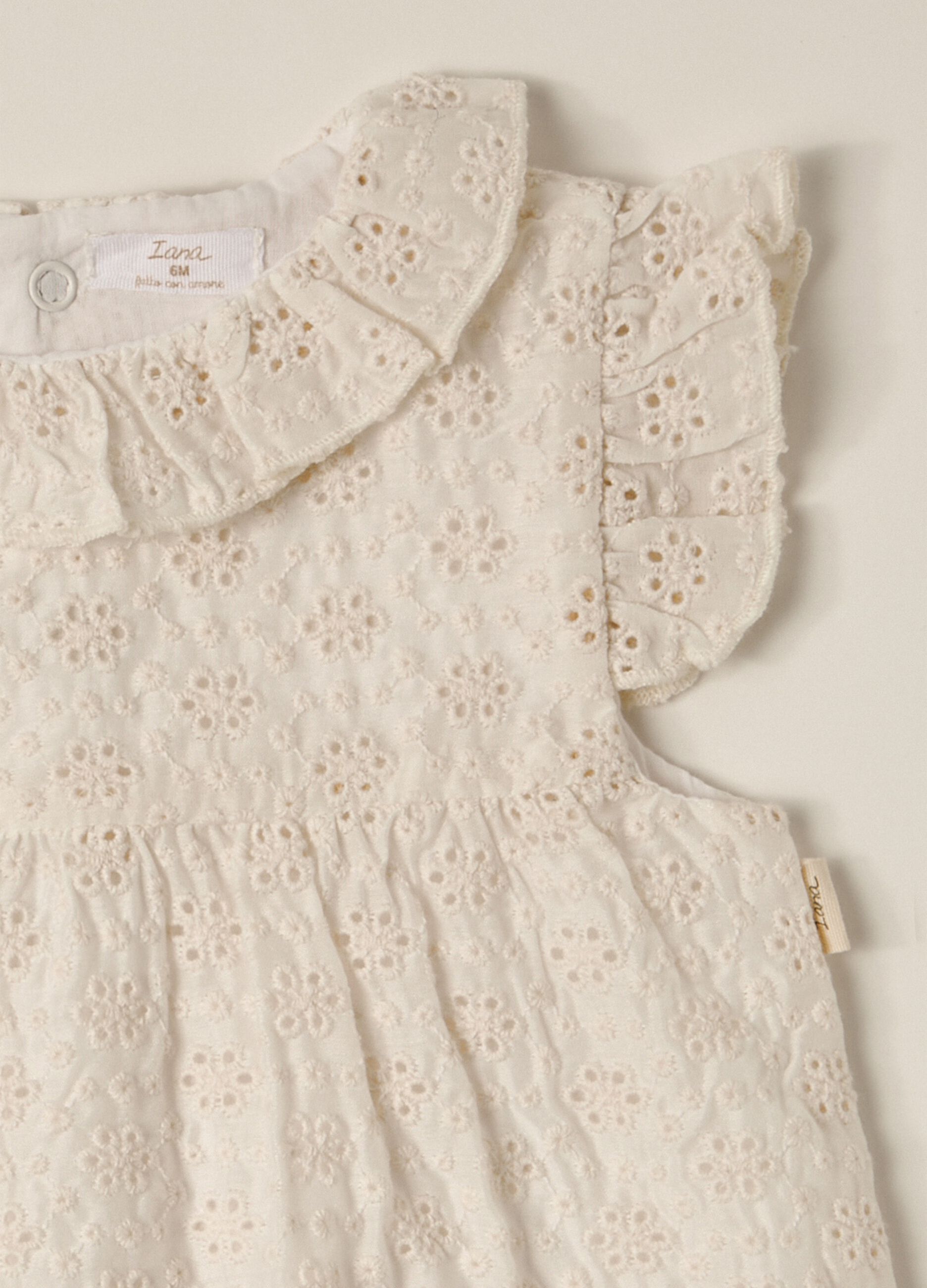 IANA newborn girl romper suit in broderie anglaise