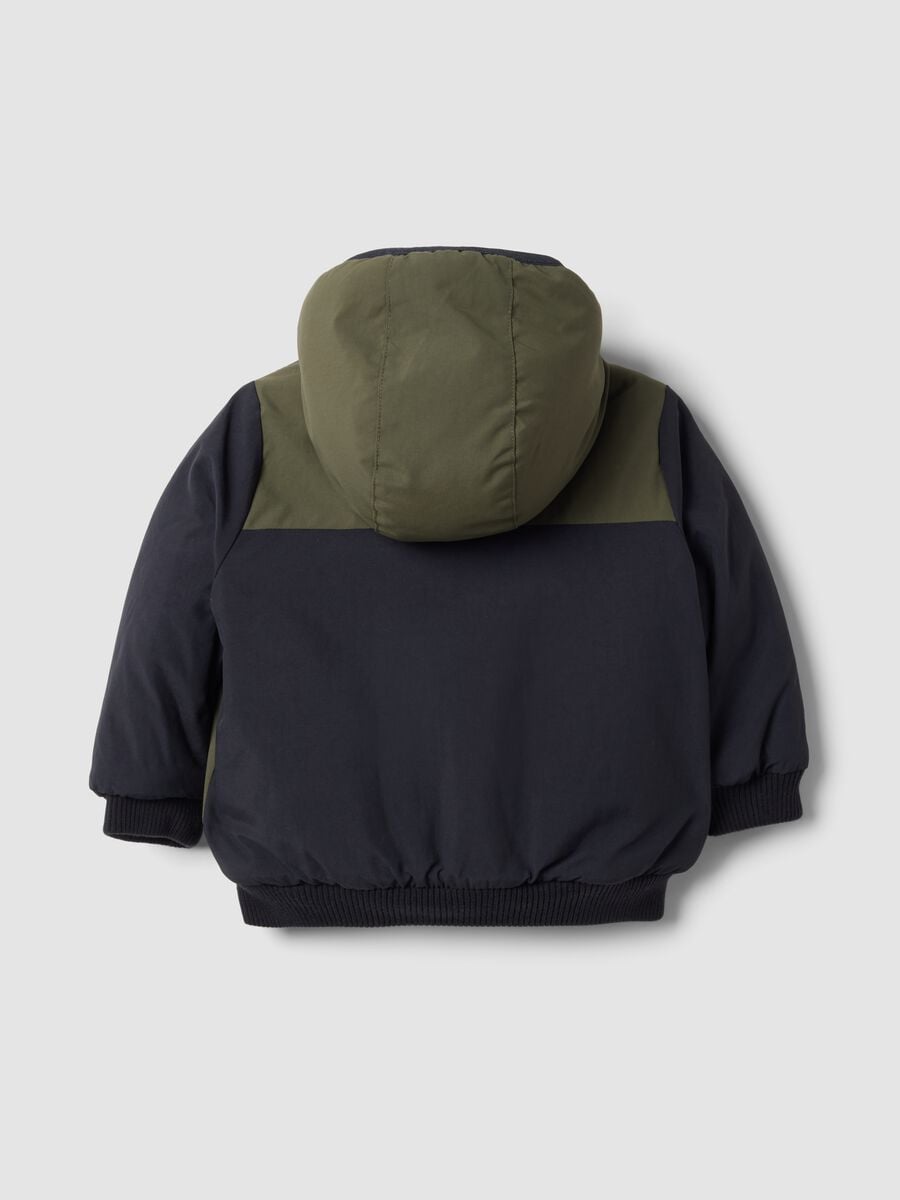 Giubbotto blu scuro con zip e cappuccio_1