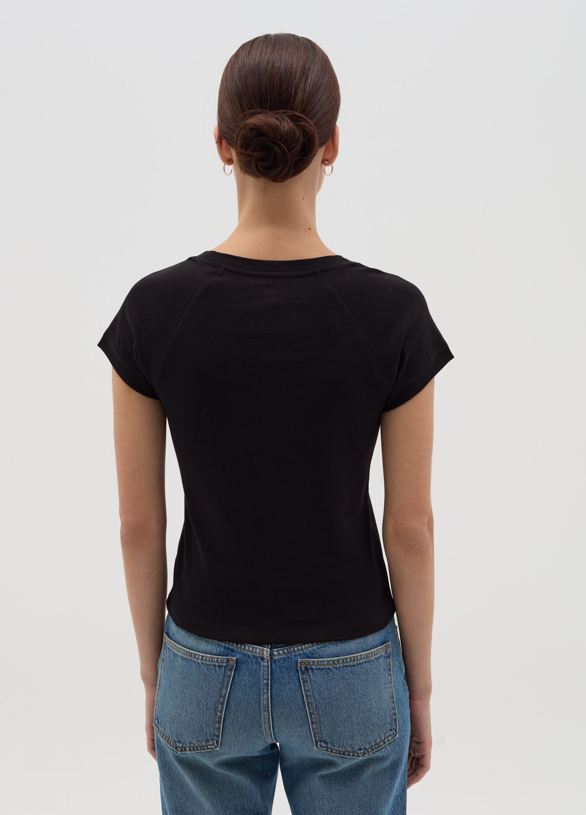 T-shirt con maniche raglan