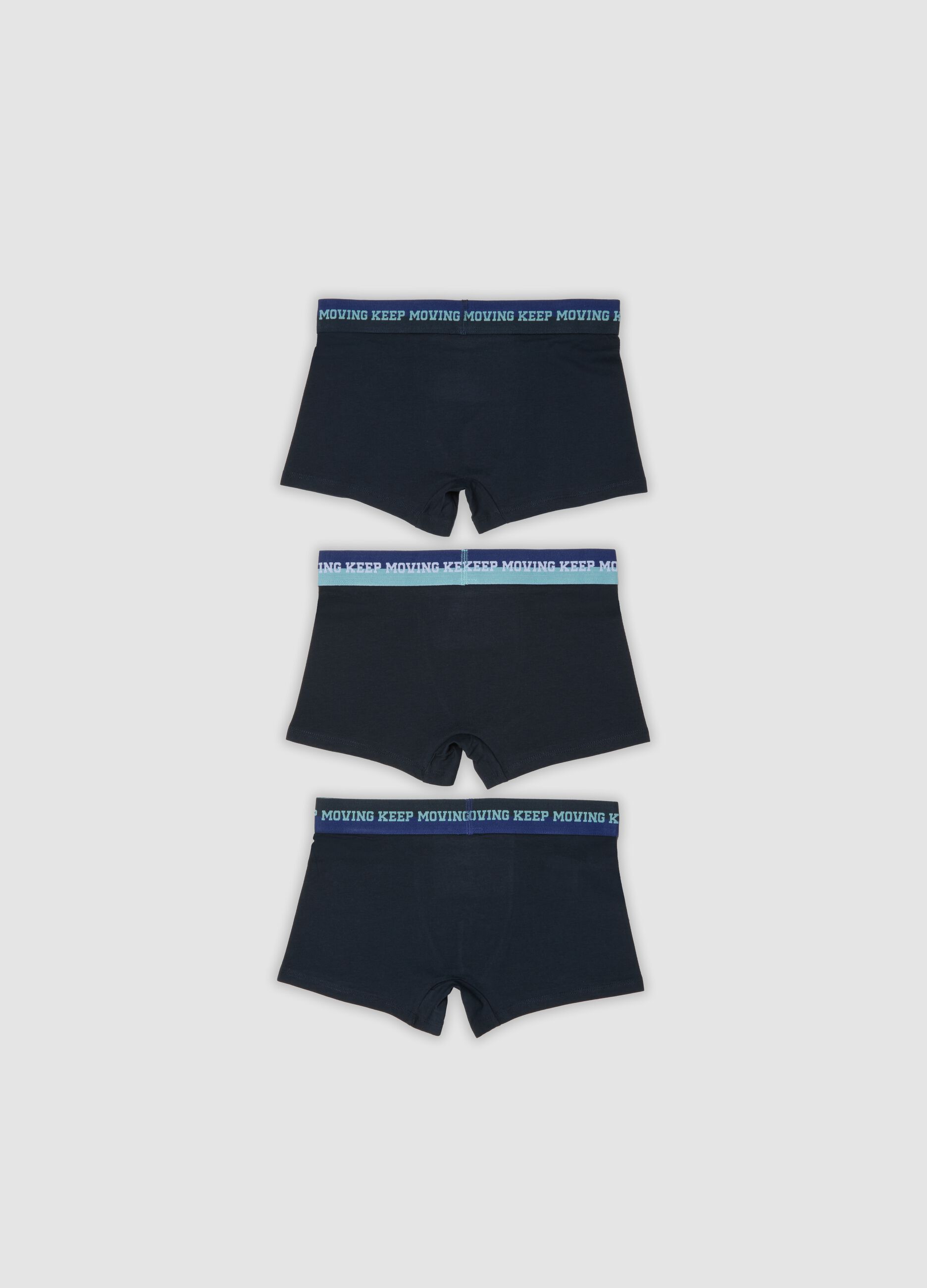 Triple pack of navy blue mid-length boys&rsquo; boxers in stretch organic cotton