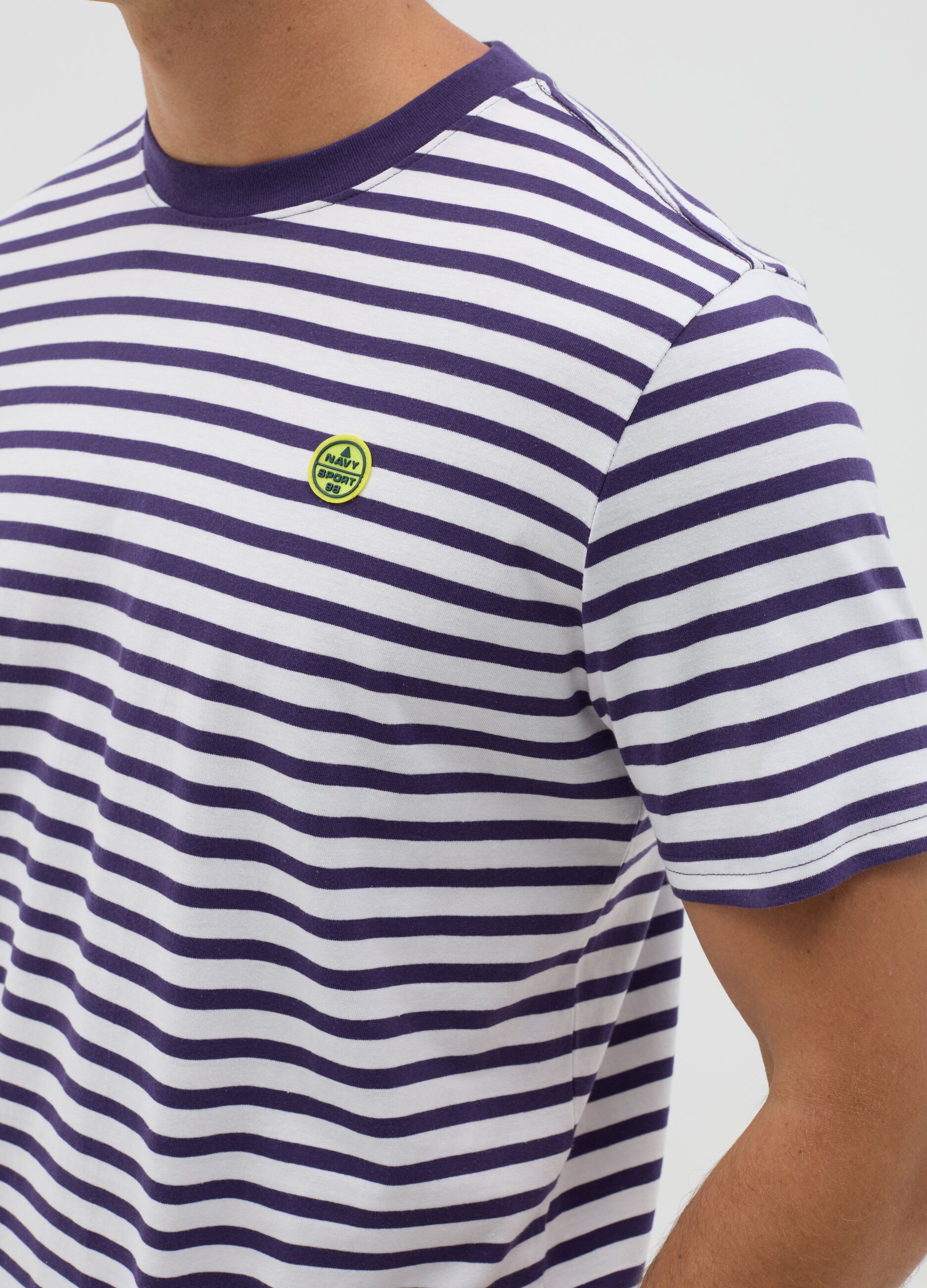 Blue and white striped T-shirt with logo