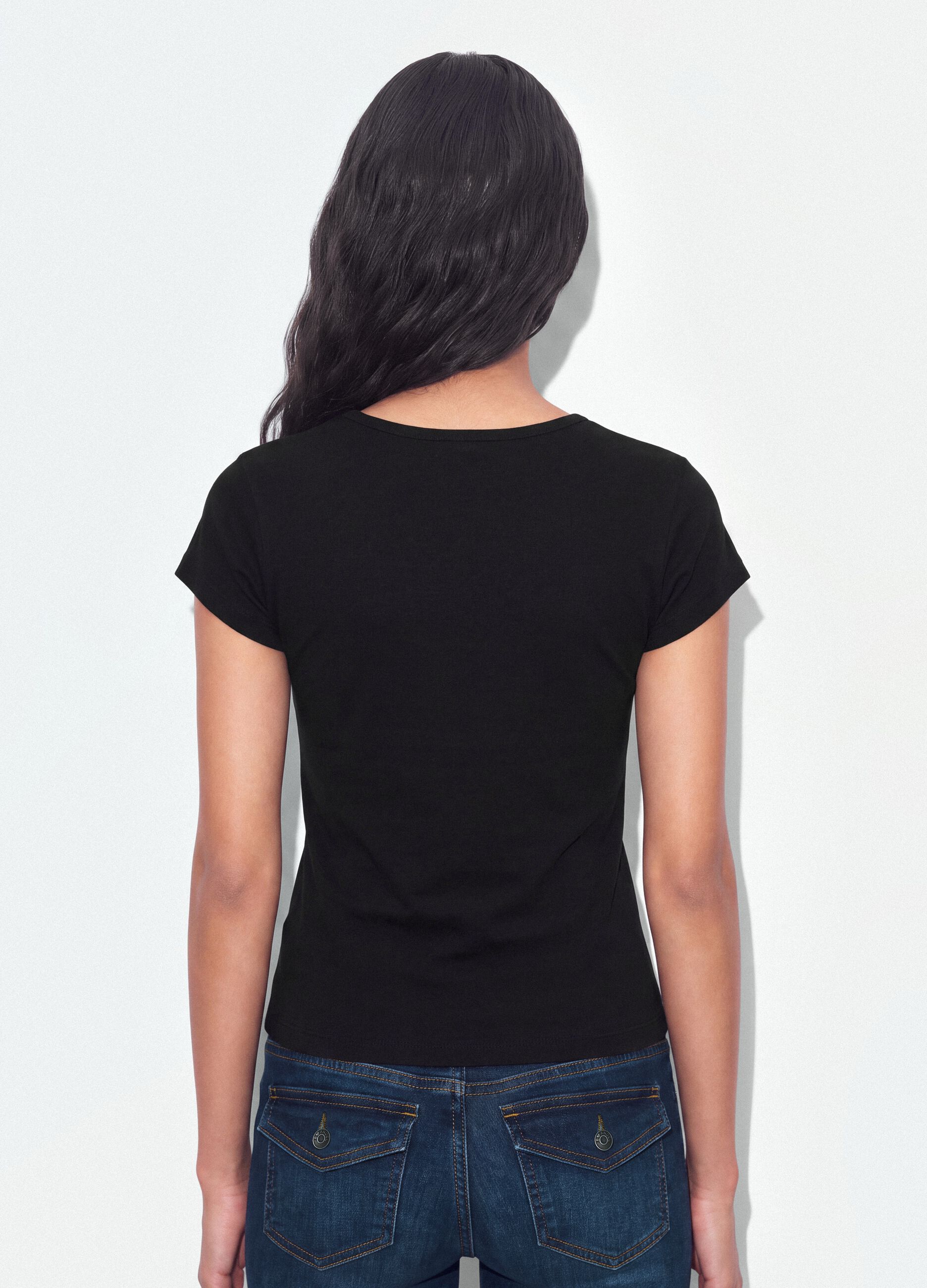 T-shirt nera in puro cotone a girocollo con scritta