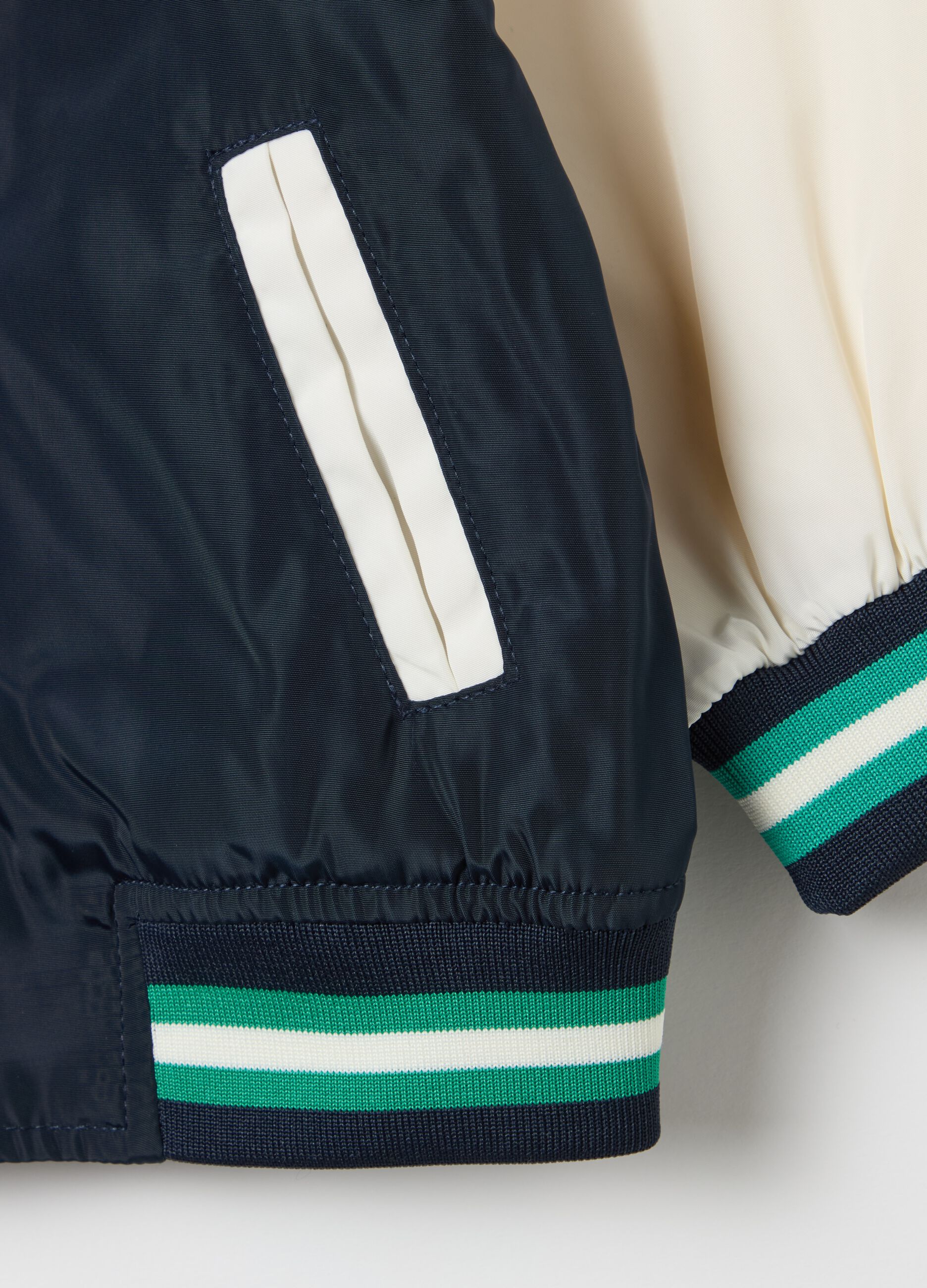 Varsity bomber jacket with "NY the league" patch