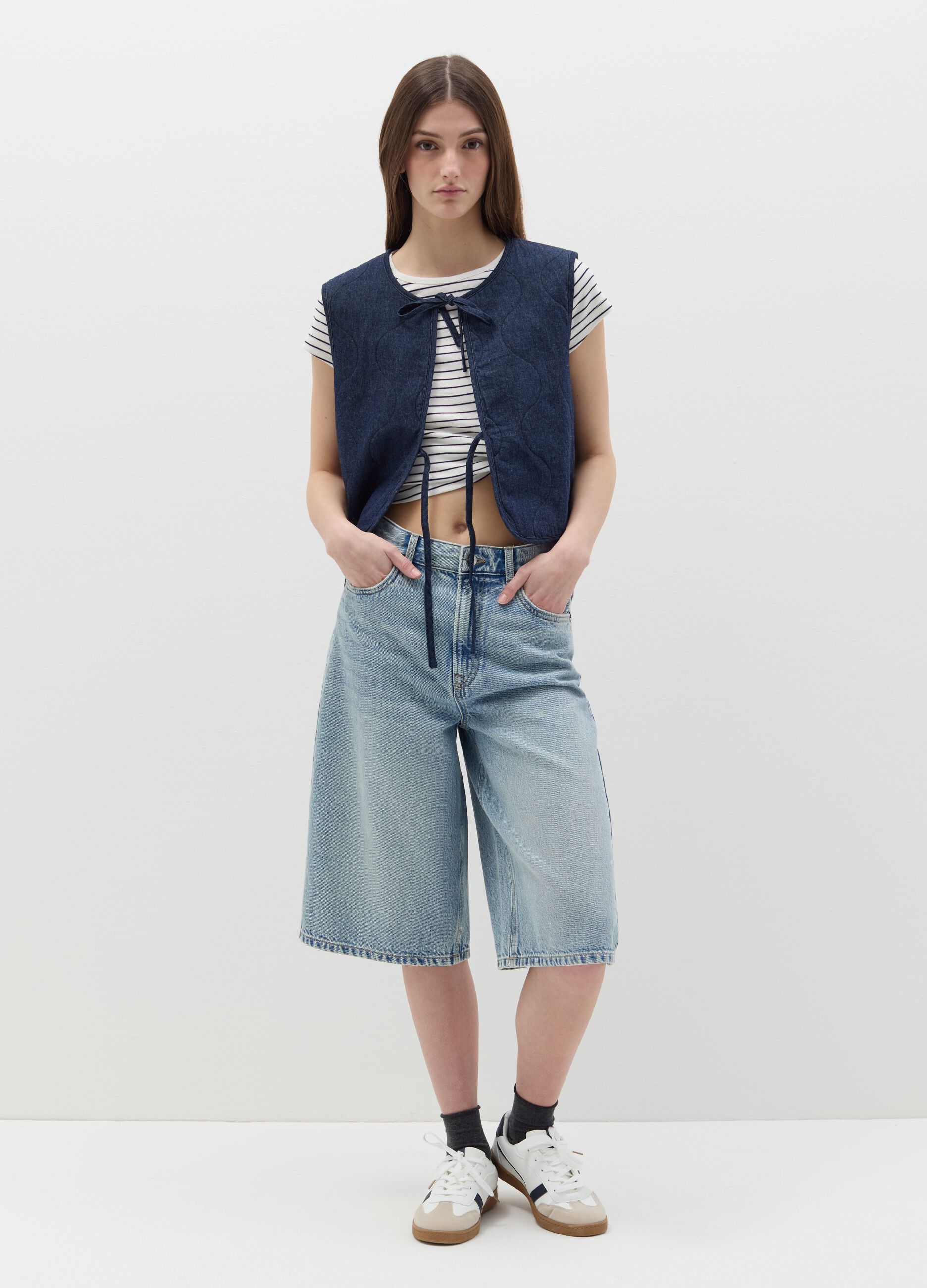 Padded gilet in denim with laces