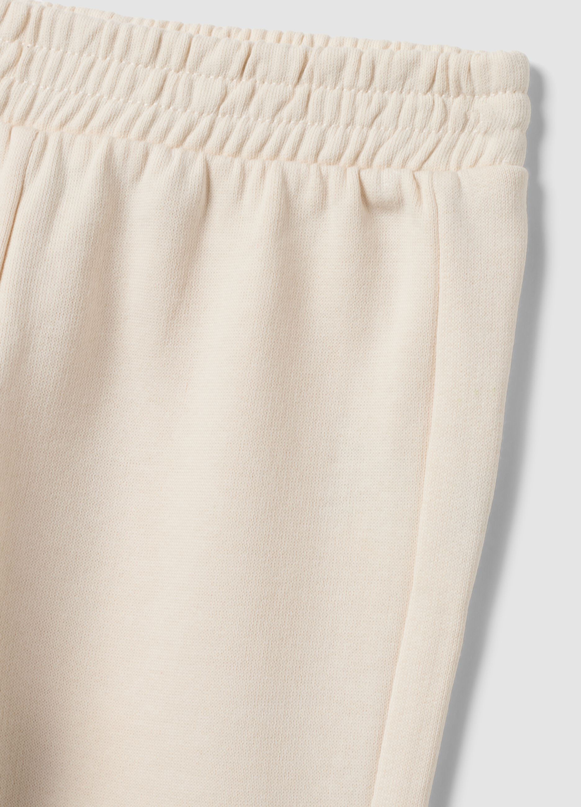 Pantaloni jogger bianchi in puro cotone per bimba