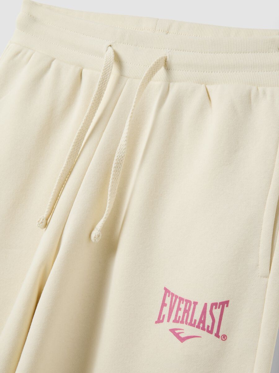 White cotton-blend wide-leg trousers_1