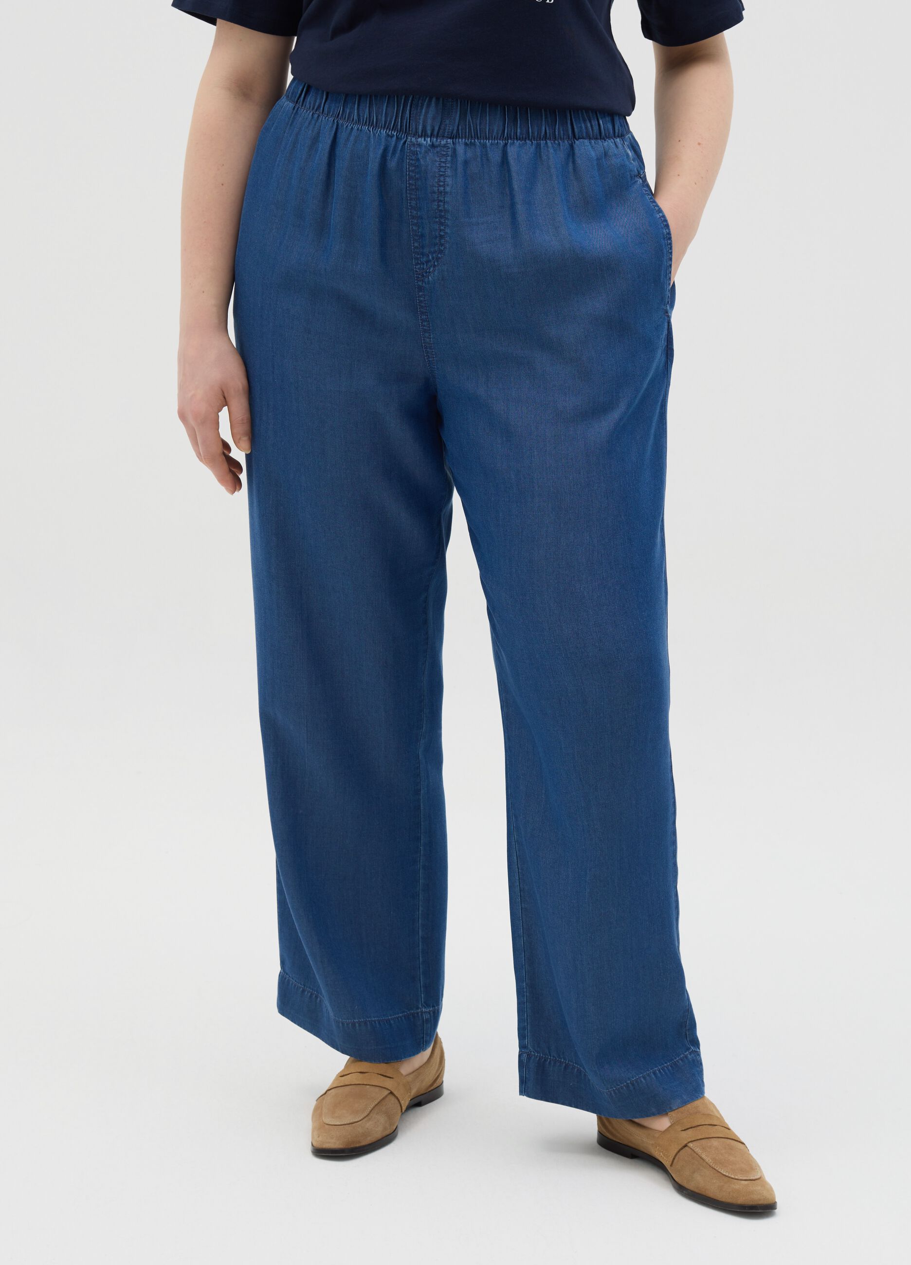 Curvy blue jogger trousers with denim effect