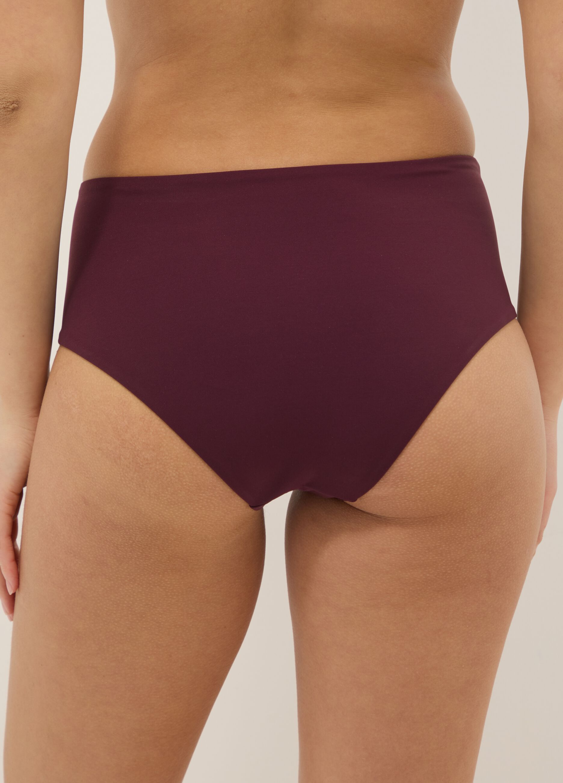 Purple high-waist stretch bikini bottoms with shaping effect