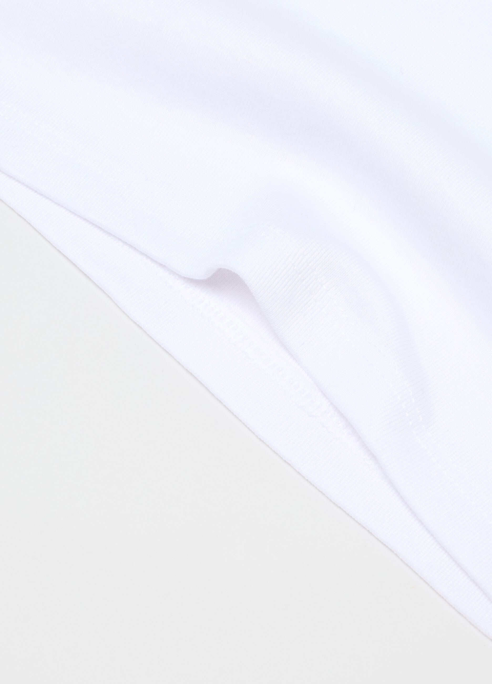 Pack of two boys' white cotton vests with a regular fit