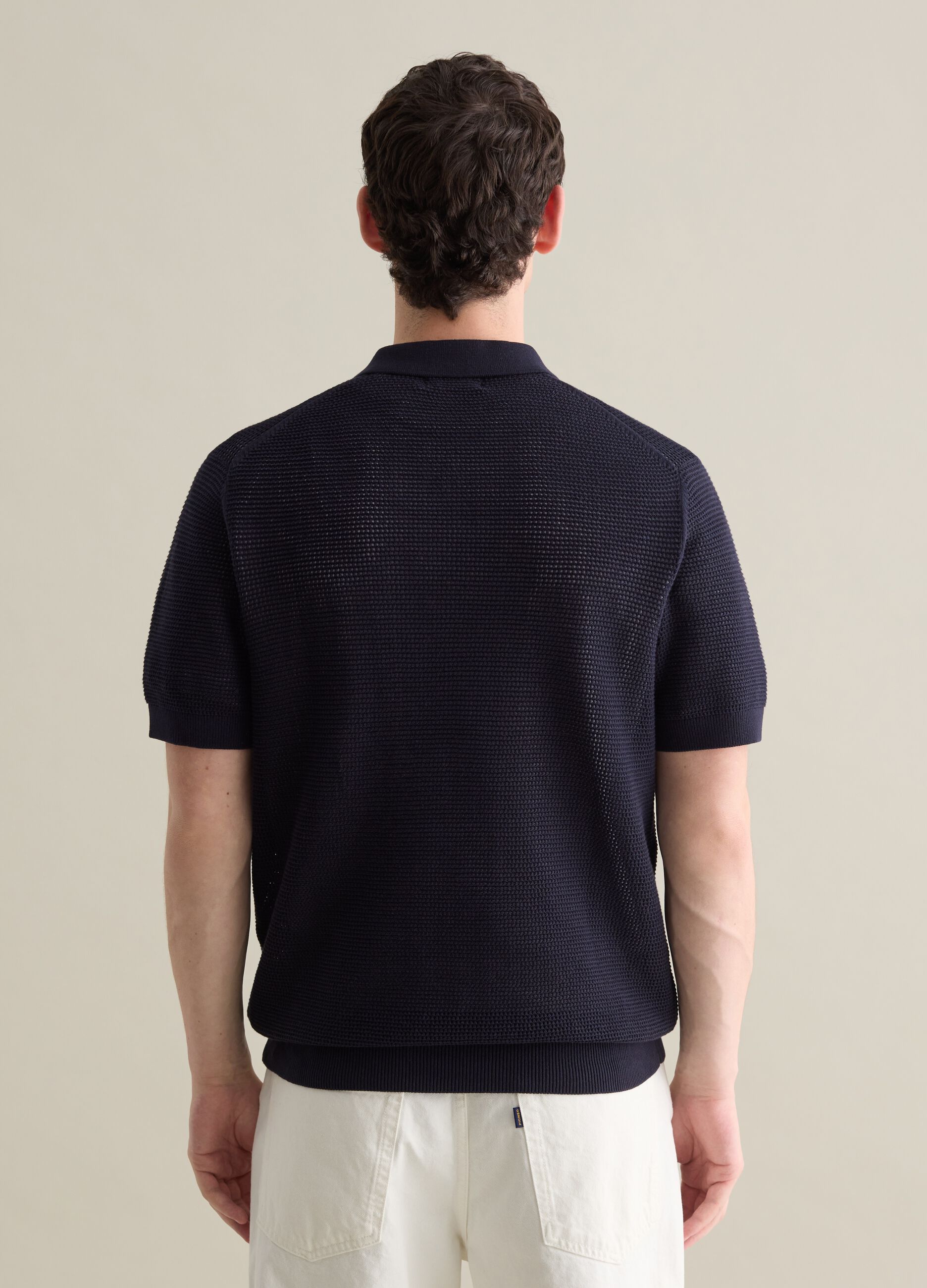 Blue polo shirt in openwork knit