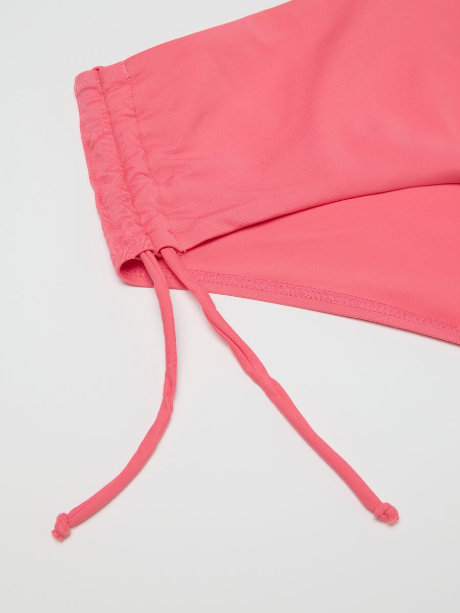 Women’s bikini briefs in pink stretch blend with gathered sides._5