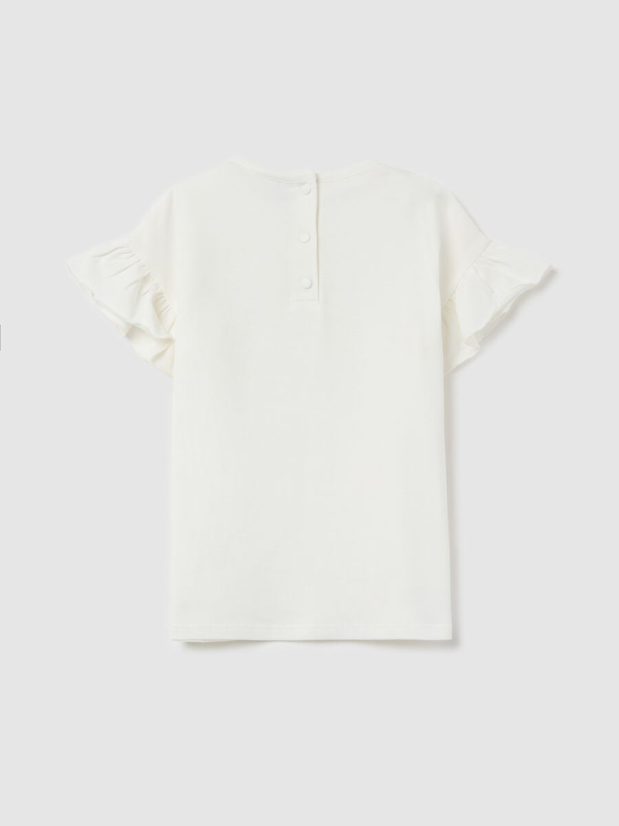 T-shirt with flounce and flower application_1