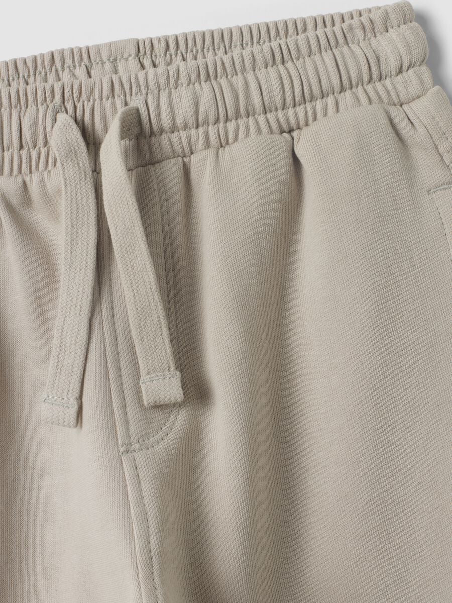 Pantaloni jogger grigi in puro cotone organico per bimbo_3