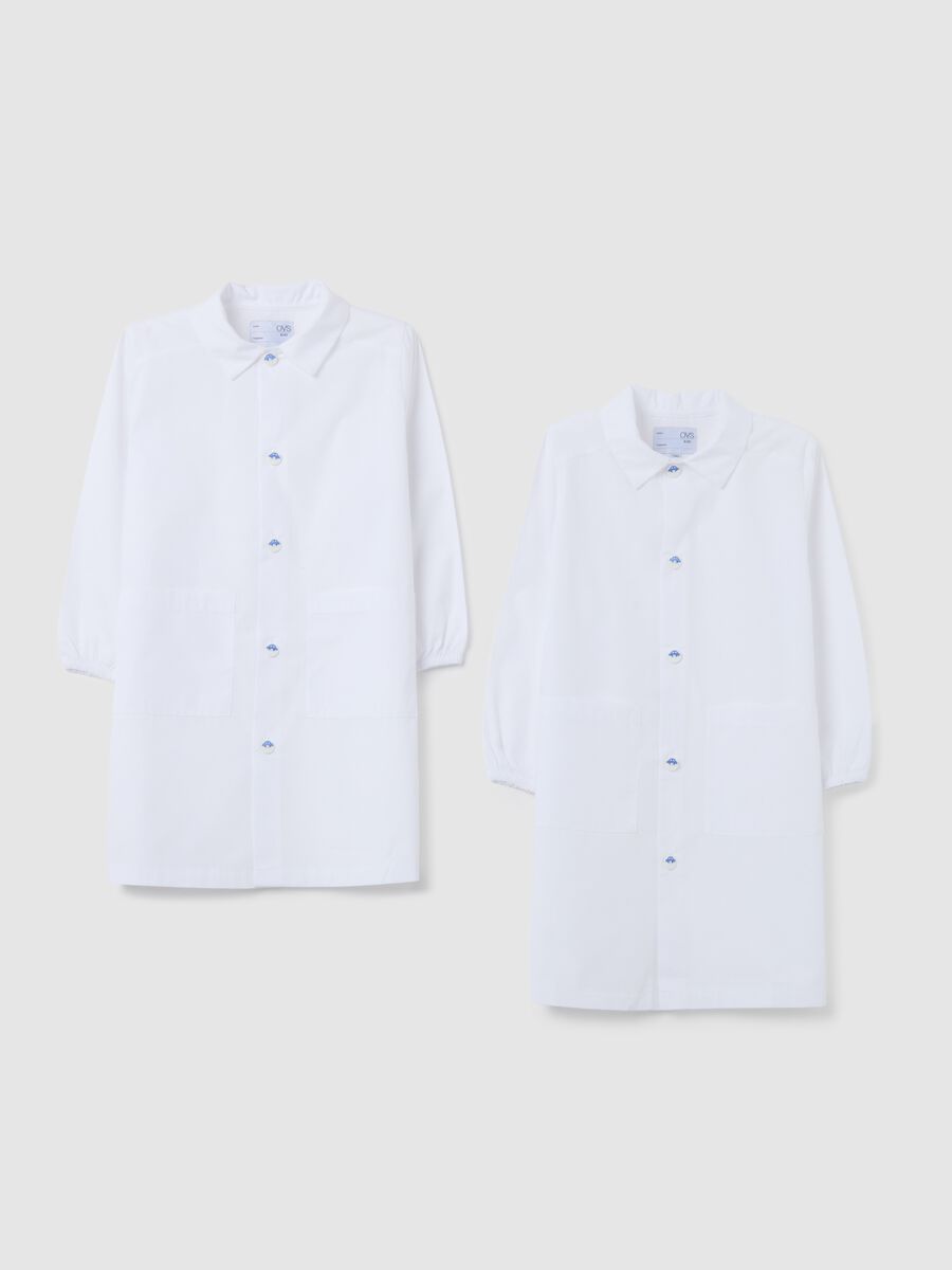 Children's school smock in white cotton blend with buttons_0