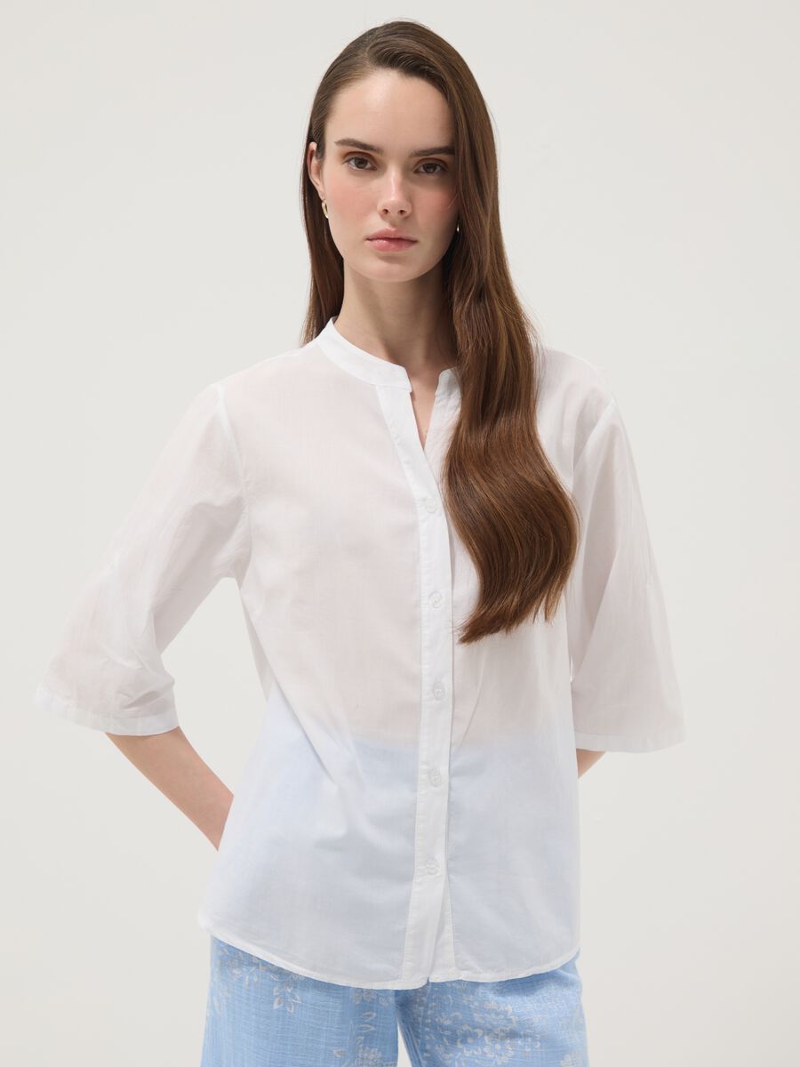 Camicia bianca in puro cotone con ricami traforati regular fit_1
