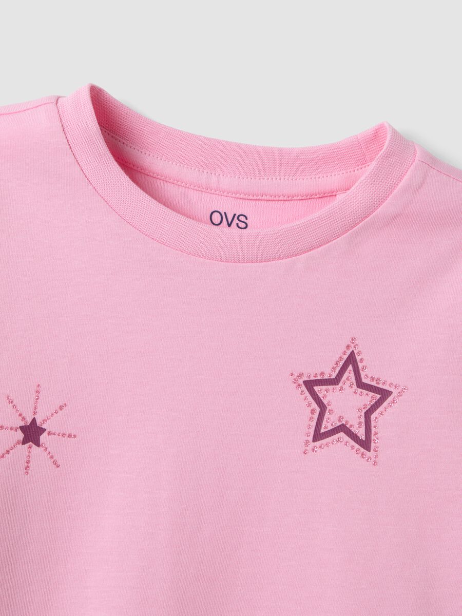 T-shirt rosa in puro cotone organico con stampa stelline per bambina_3