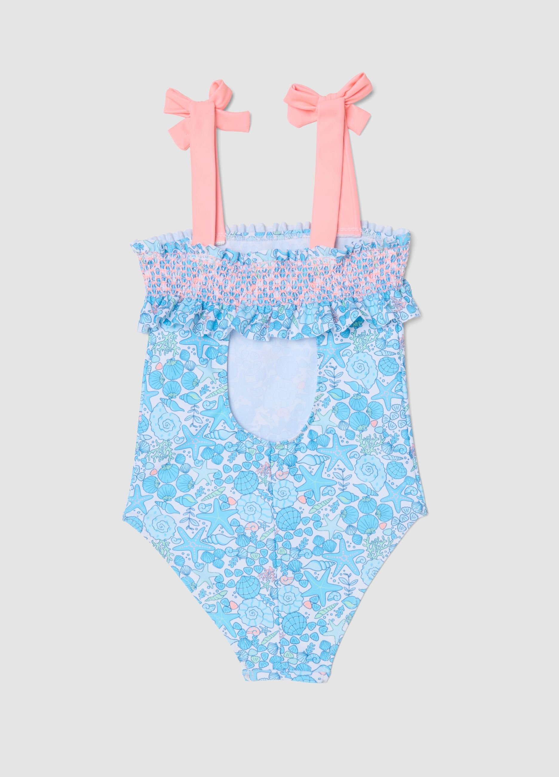 Blue stretch swimsuit with marine print for girls