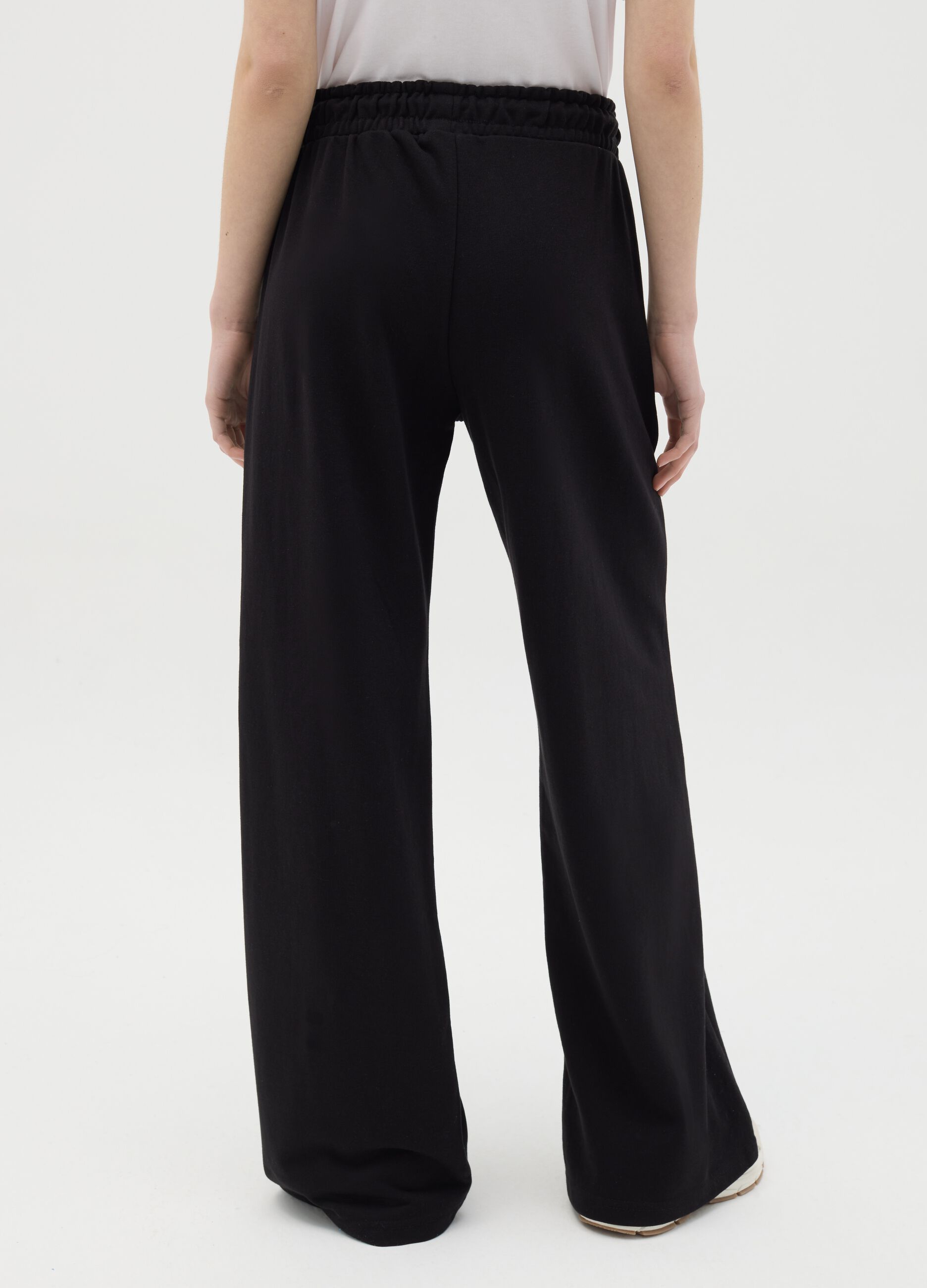 Joggers neri a campana con coulisse e stampa logo