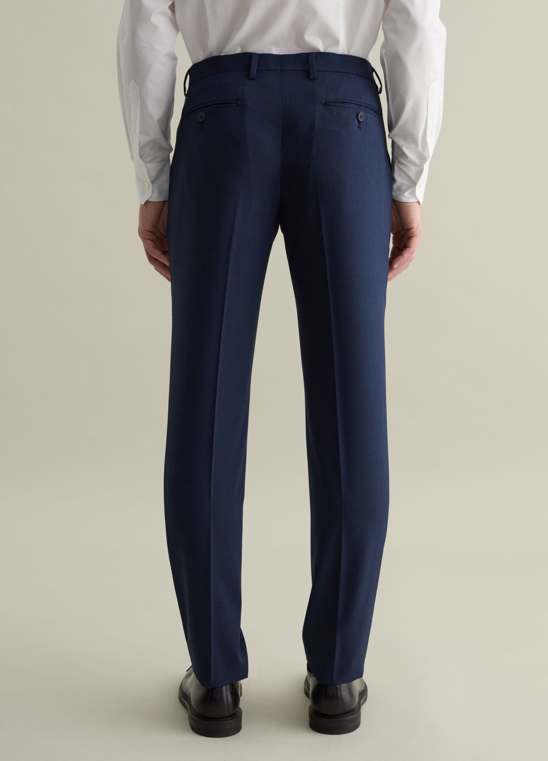 Pantalone slim fit con micro trama