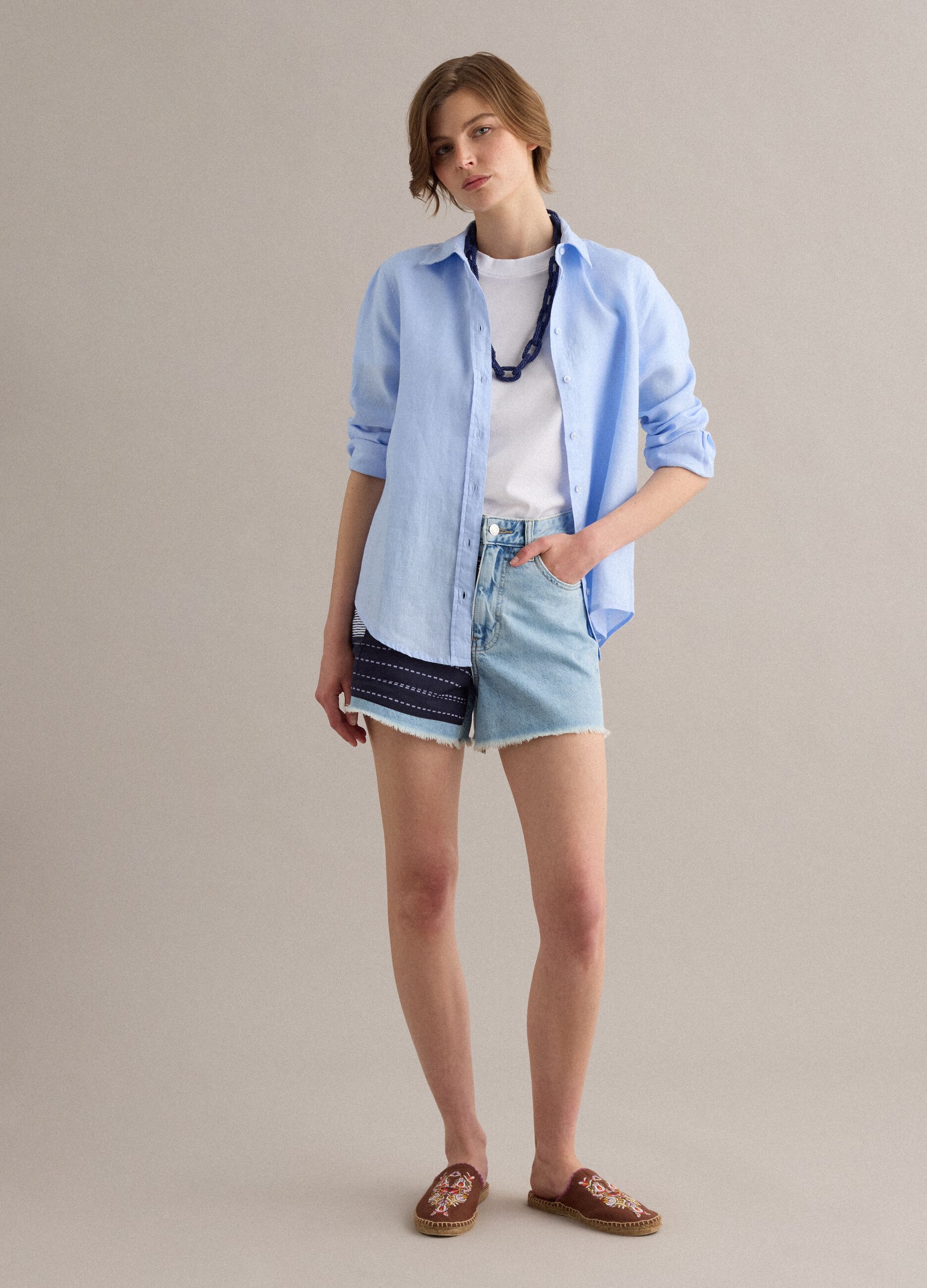 Blue necklace with braided glass beads