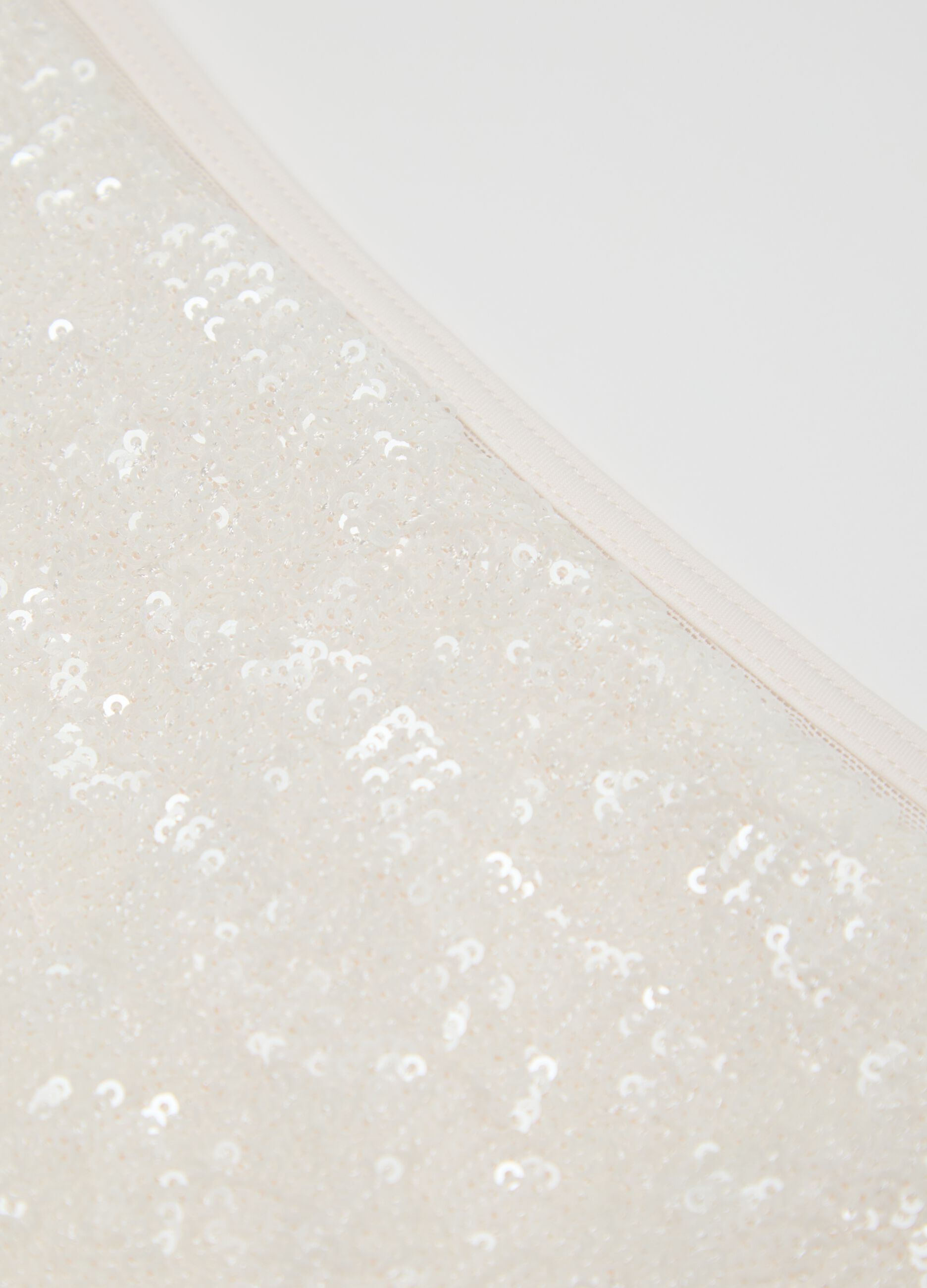 Slip brasiliana da donna in tessuto elasticizzato bianco con paillettes