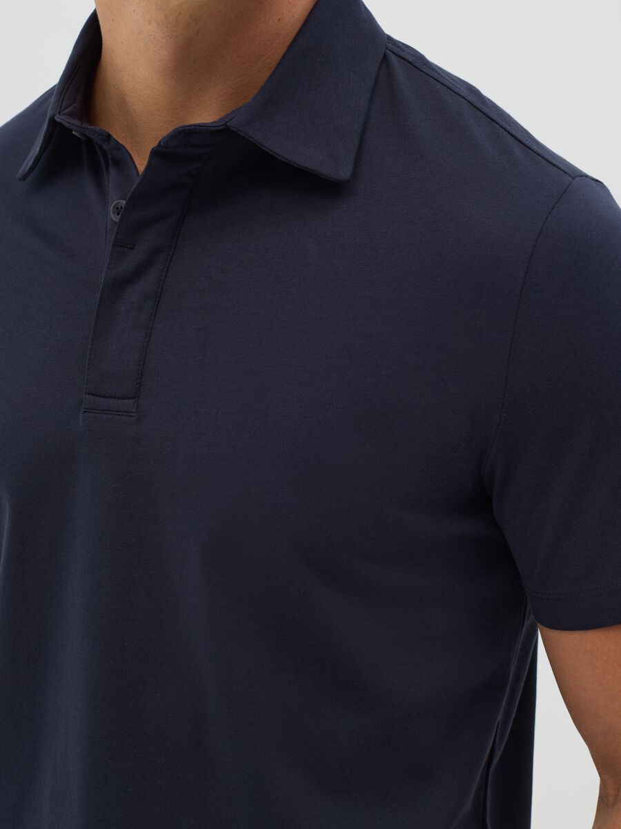Blue polo shirt in technical fabric_3