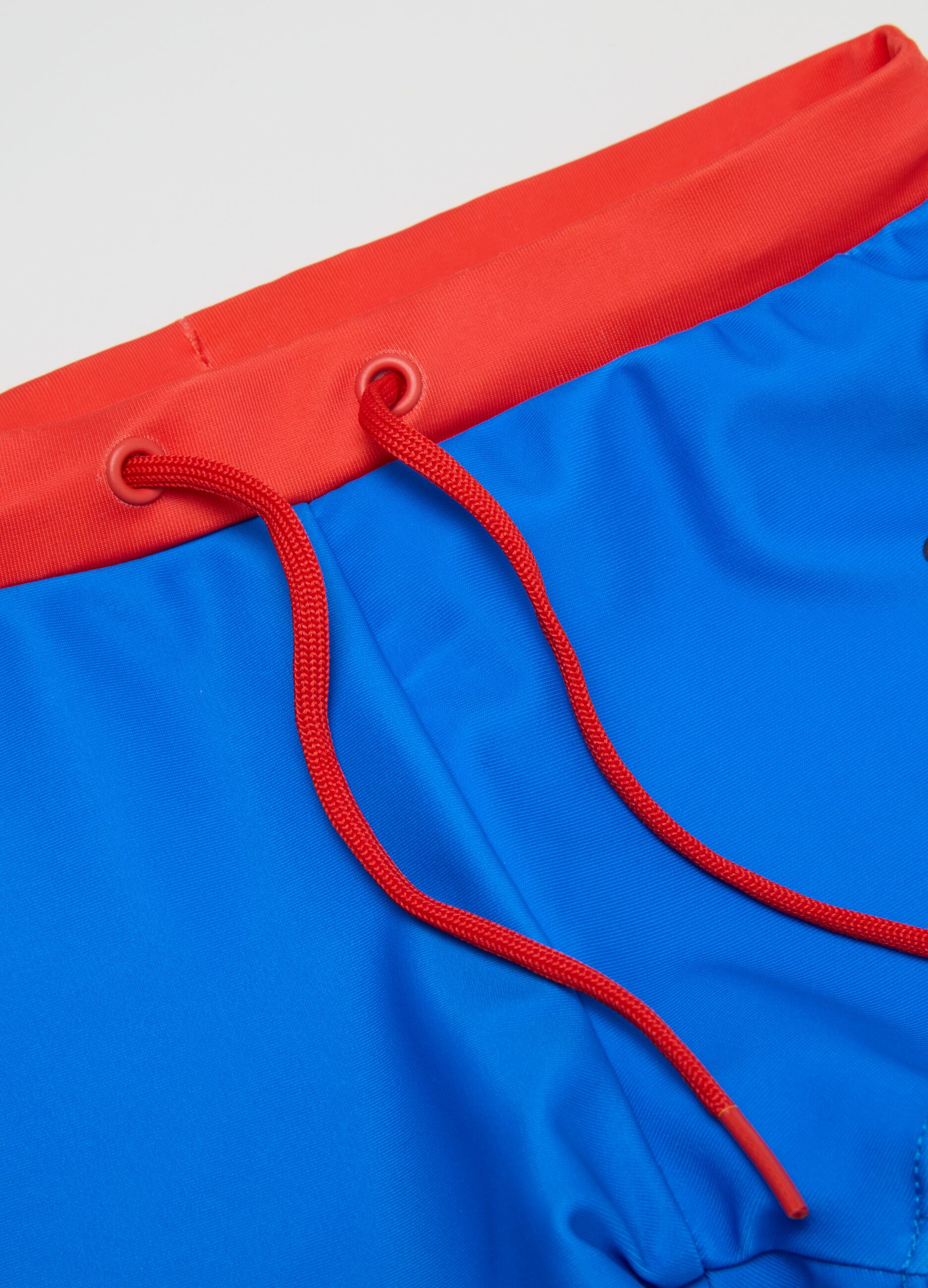 Multicoloured stretch blend children's swimsuit with red accents
