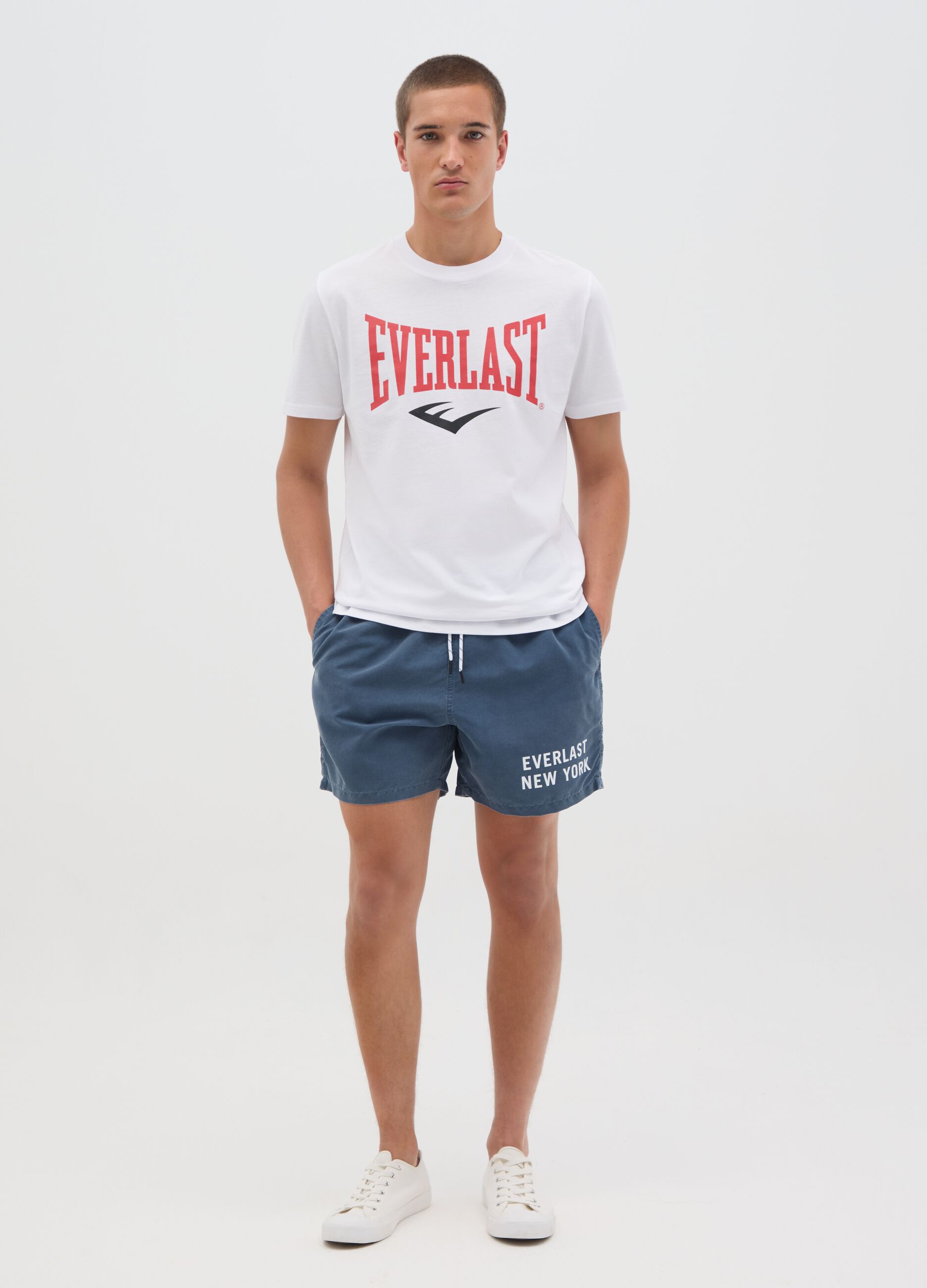 Blue swimming trunks with logo print